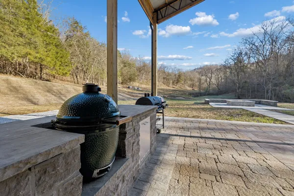 a backyard of a house with lots of green space