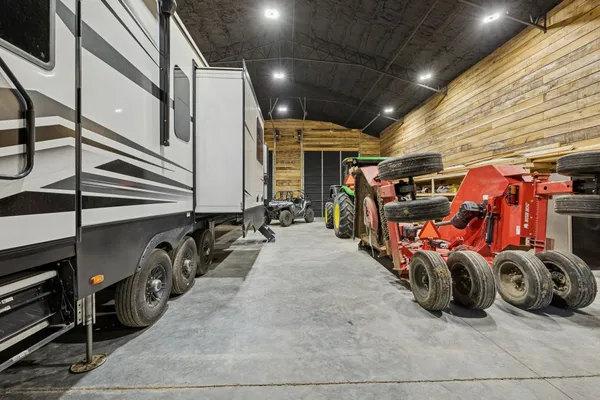 a backyard of a house with a yard and outdoor seating