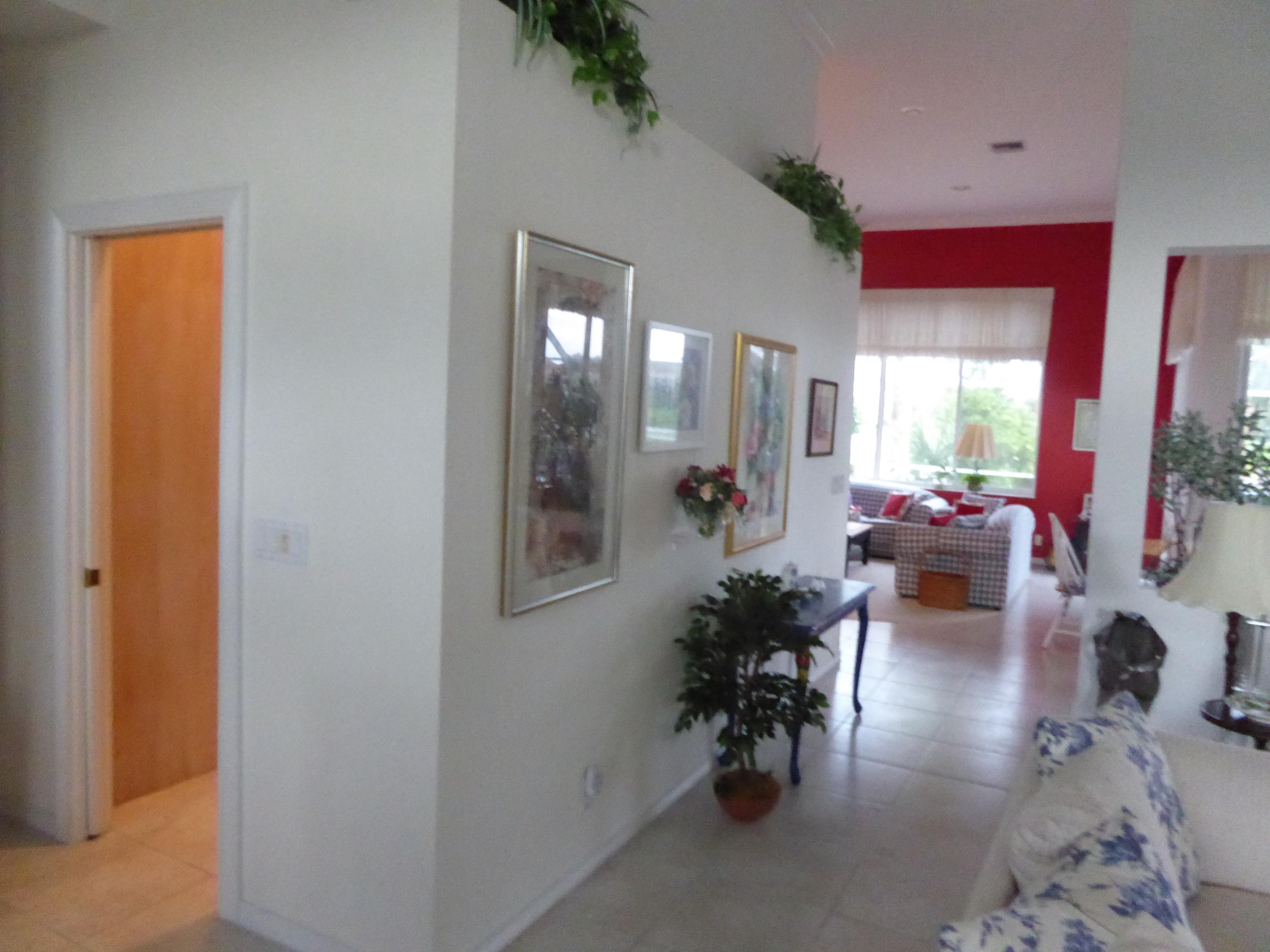 17664 Sealakes Drive Boca Raton, FL 33498 - Photo 3 of 42 View from Dining Room to family Room