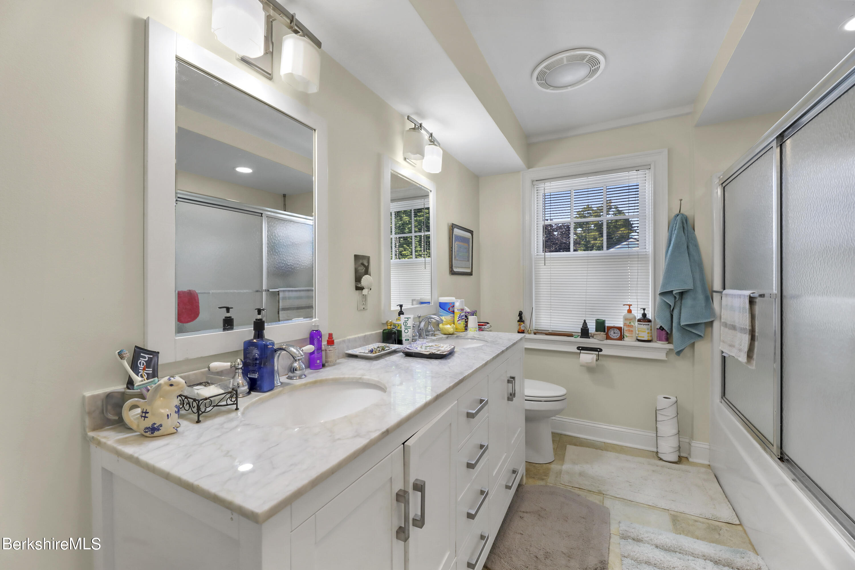29 Main Street West Stockbridge, MA 01266 - Photo 30 of 51 a bathroom with a sink double vanity granite tub shower and a mirror
