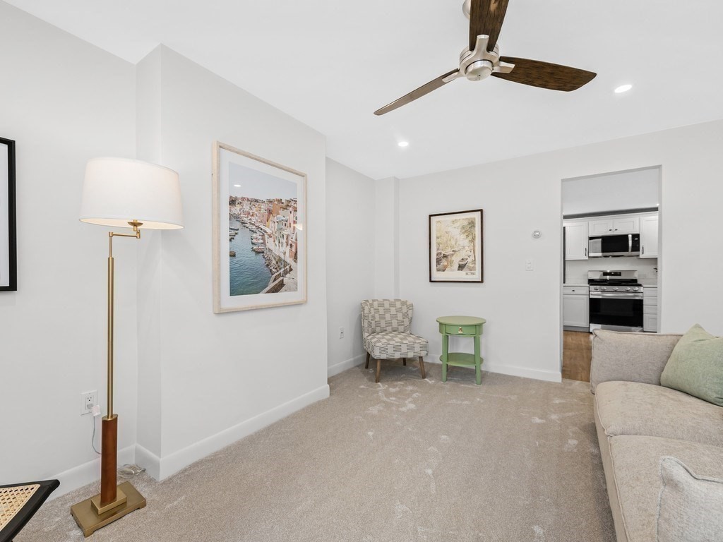18 R Polk Street Boston, MA 02129 - Photo 6 of 19 a living room with furniture and a window