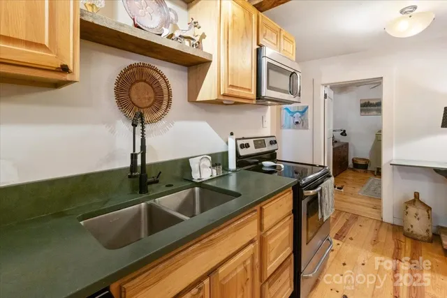 a bedroom with furniture and a dresser