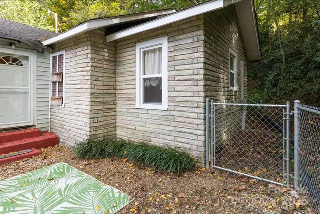 a backyard of a house with lots of green space