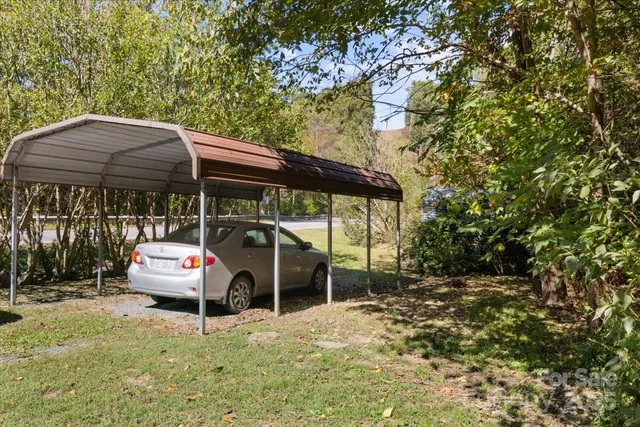 a room with a dresser and a window