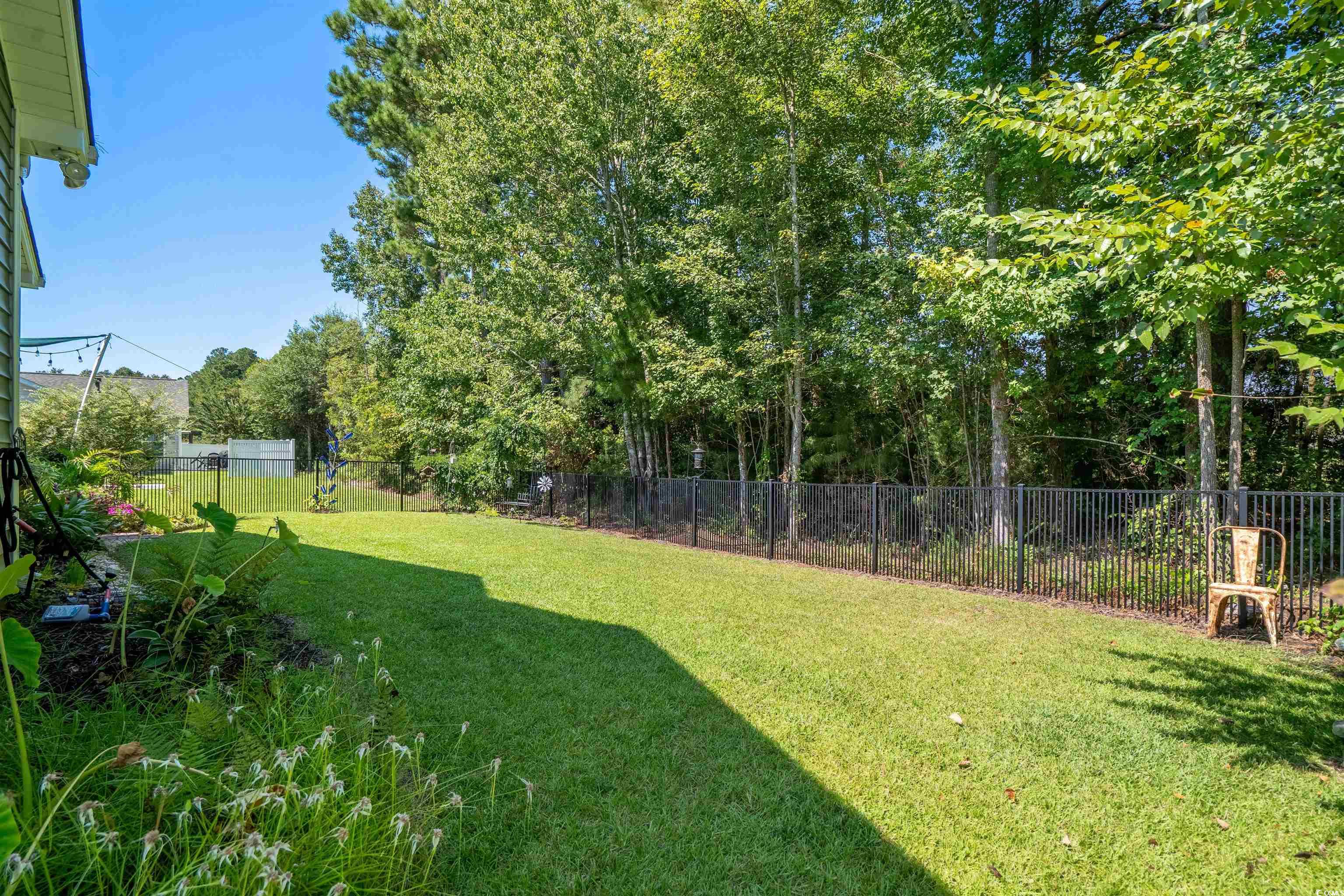 826 Cypress Way Little River, SC 29566 - Photo 33 of 40 View of fenced backyard