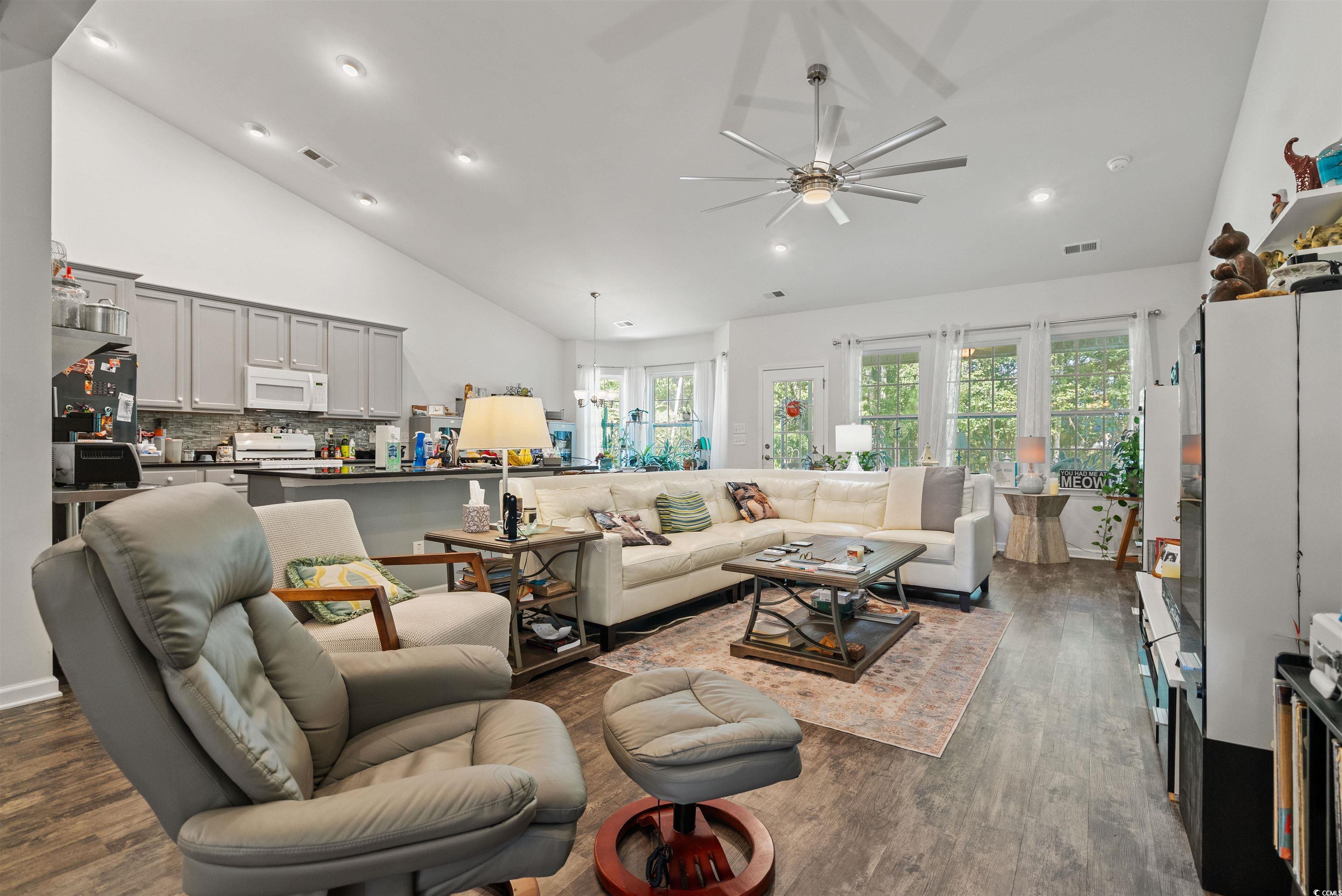 826 Cypress Way Little River, SC 29566 - Photo 8 of 40 Living room featuring dark wood finished floors, recessed lighting, and high vaulted ceiling