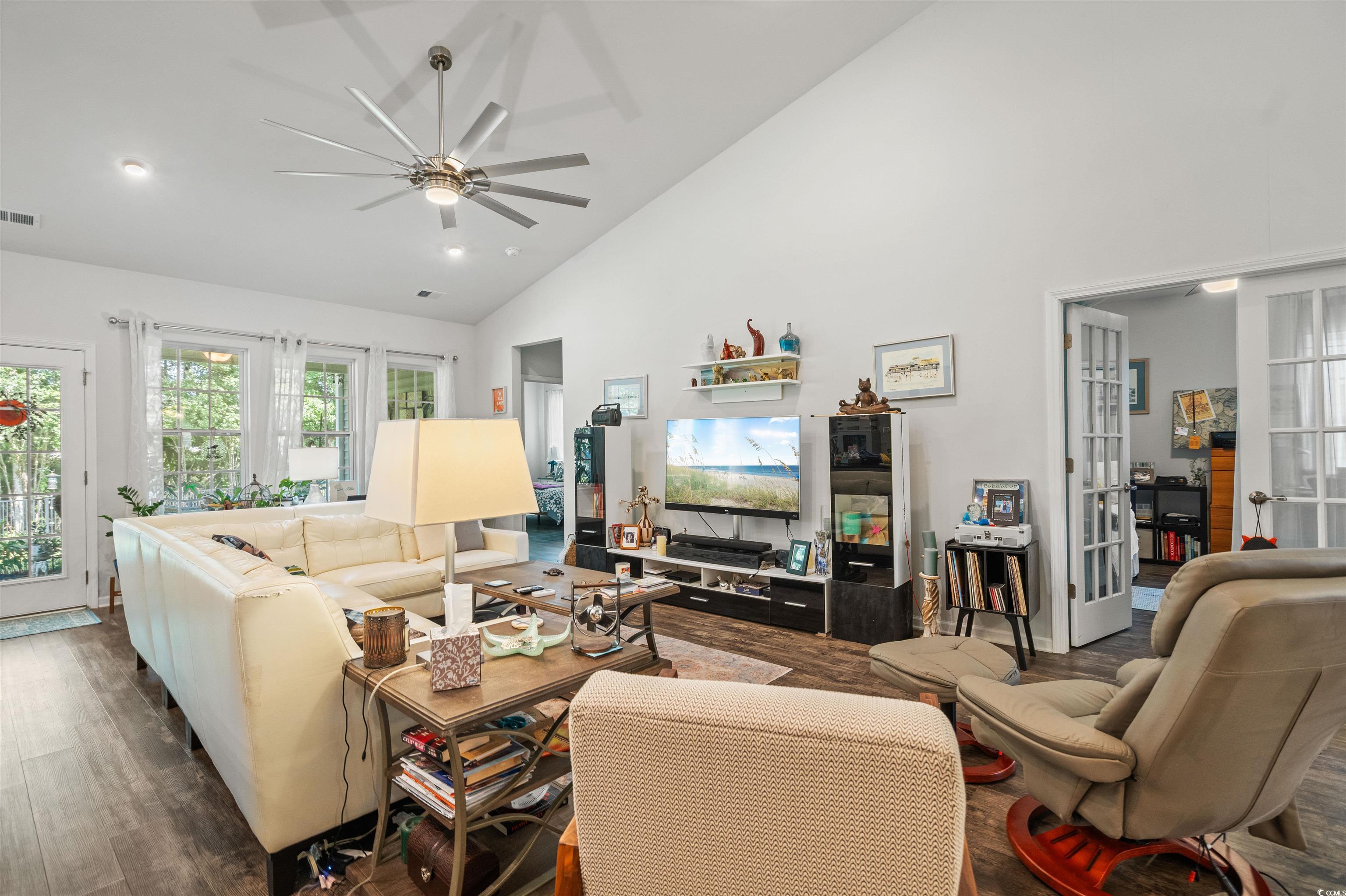 826 Cypress Way Little River, SC 29566 - Photo 9 of 40 Living area with high vaulted ceiling, french doors, wood finished floors, a ceiling fan, and recessed lighting