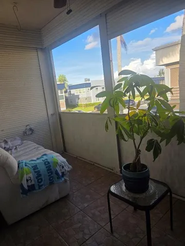 a vase of flowers sitting on a table
