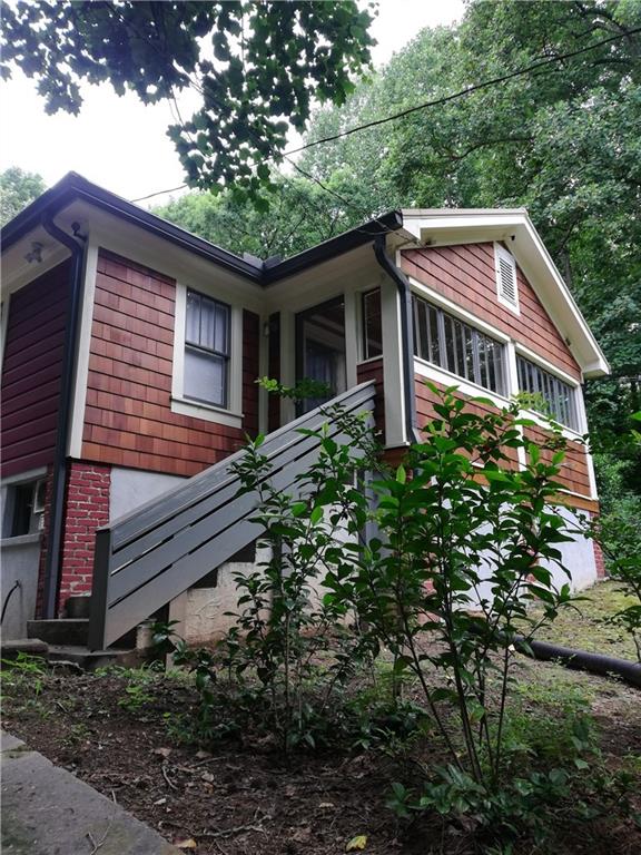 3098 Azlee Place Northwest Atlanta, GA 30318 - Photo 1 of 1 a backyard of a house with lots of green space