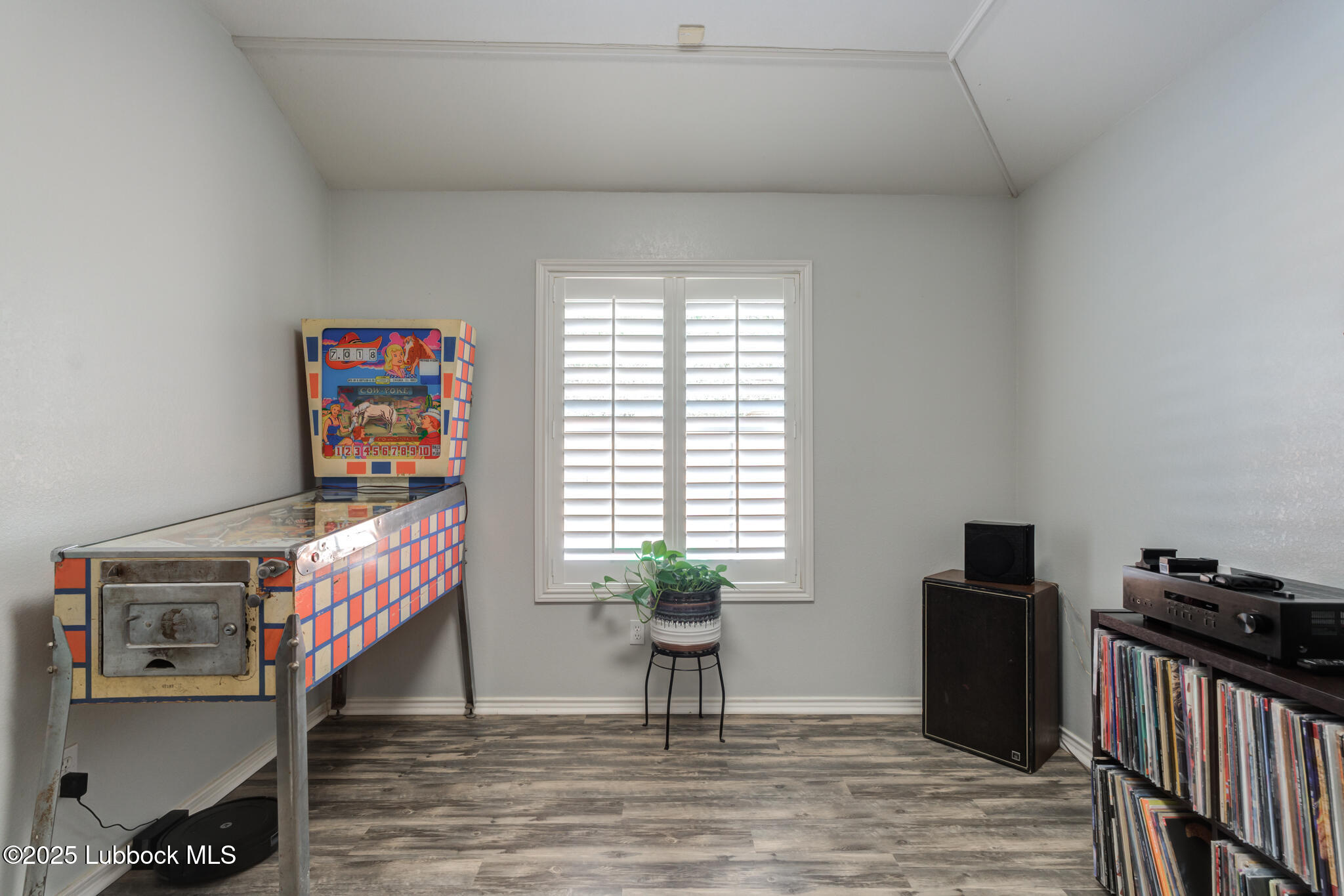 144 North Utica Avenue Lubbock, TX 79416 - Photo 11 of 46 a living room with furniture and a window