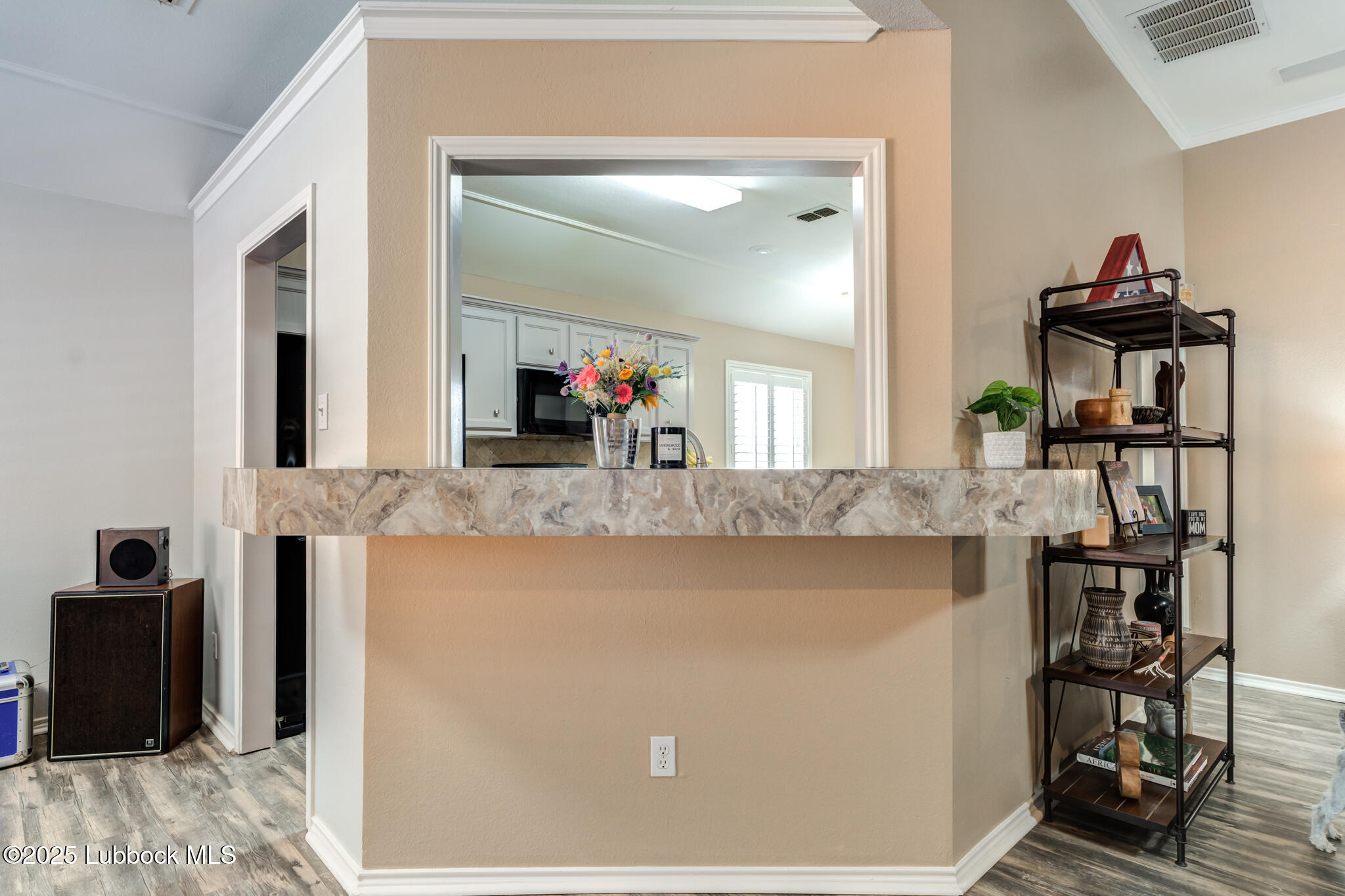 144 North Utica Avenue Lubbock, TX 79416 - Photo 12 of 46 a bathroom with a granite countertop sink and a mirror