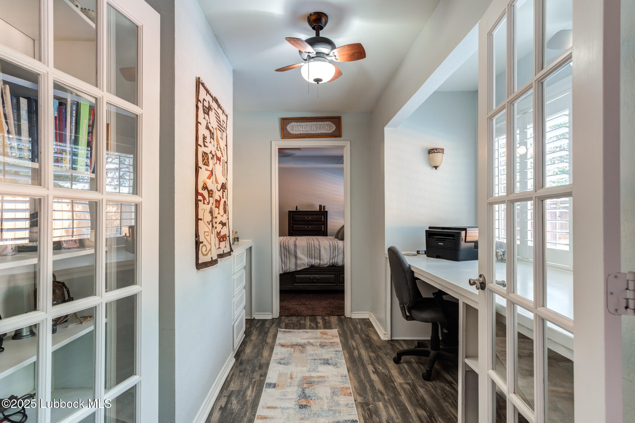 144 North Utica Avenue Lubbock, TX 79416 - Photo 21 of 46 a very nice looking room with a large window and a flat screen tv