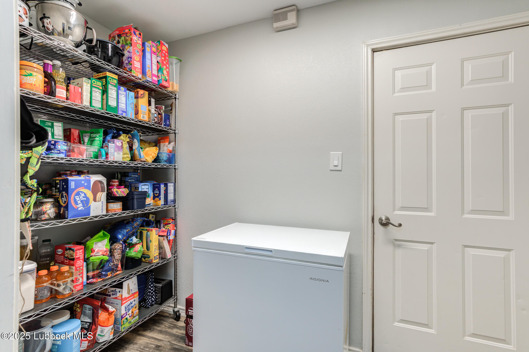 144 North Utica Avenue Lubbock, TX 79416 - Photo 36 of 46 a room with book shelf and a book shelf