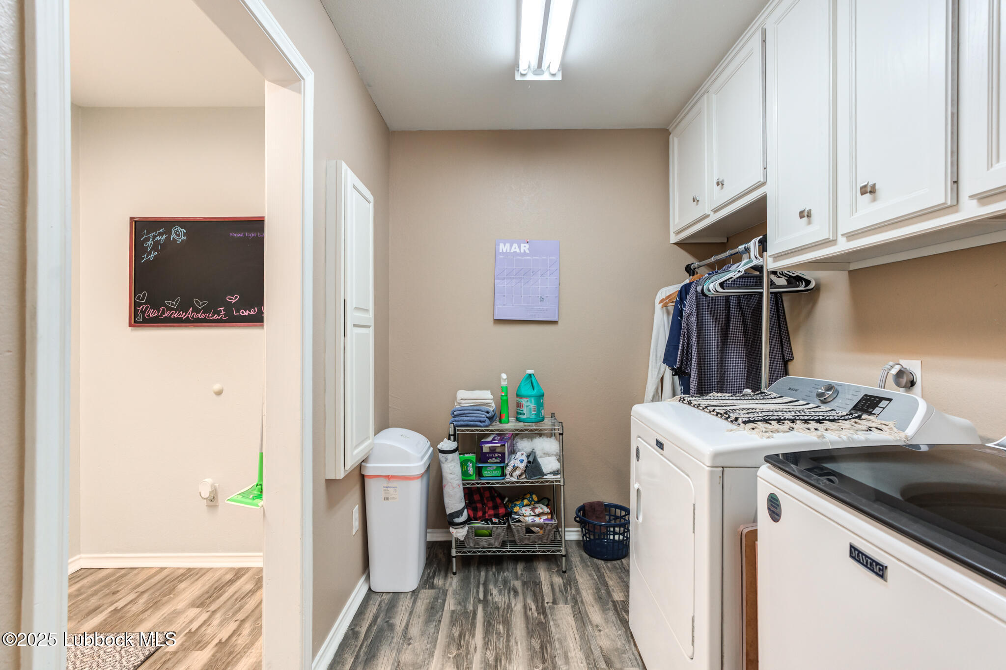 144 North Utica Avenue Lubbock, TX 79416 - Photo 37 of 46 a kitchen that has a stove and a wooden floor