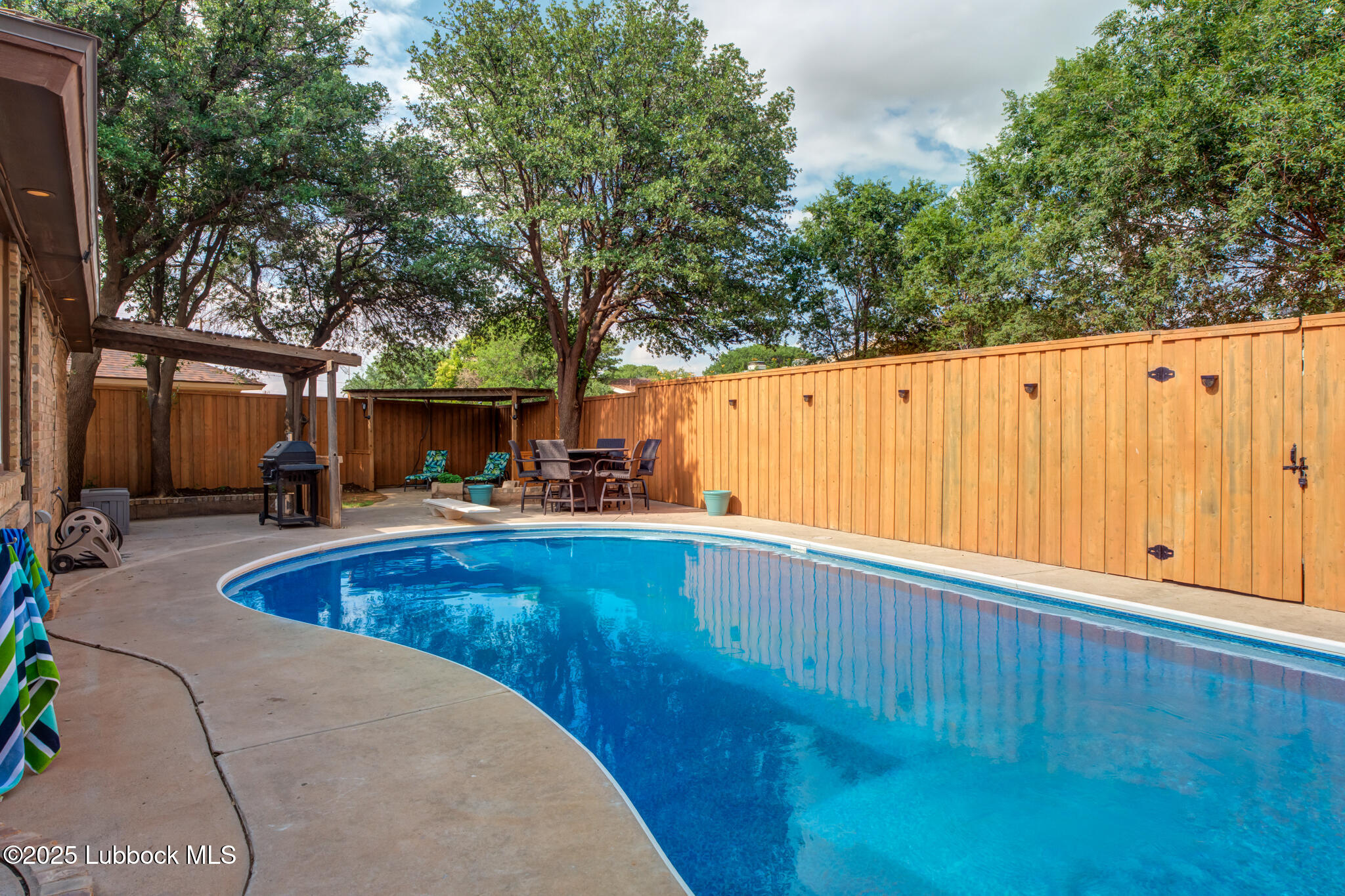 144 North Utica Avenue Lubbock, TX 79416 - Photo 38 of 46 a view of swimming pool with seating area