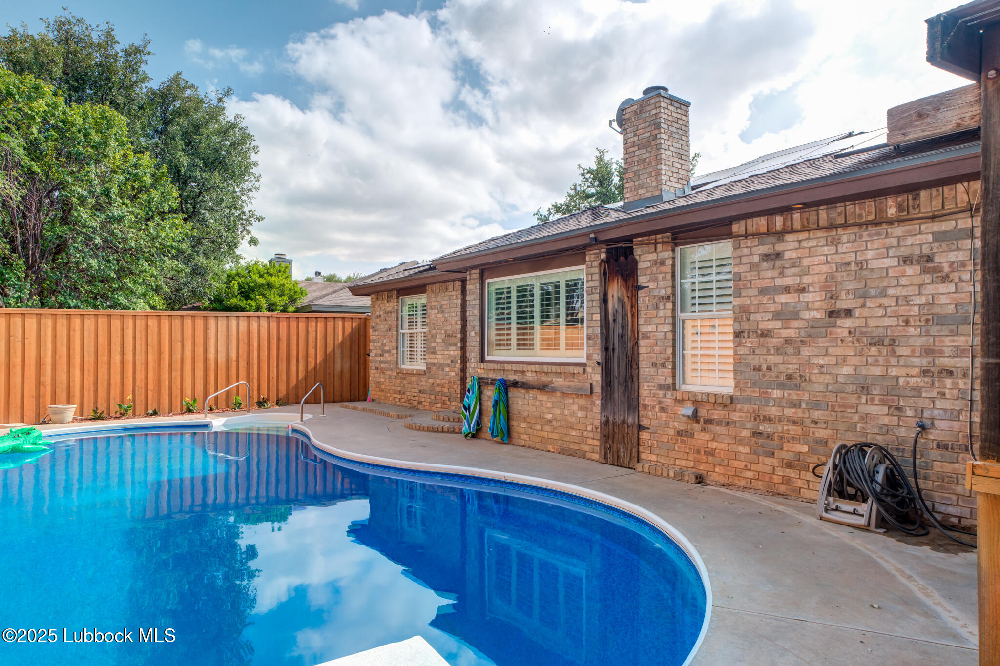 144 North Utica Avenue Lubbock, TX 79416 - Photo 42 of 46 a view of a backyard with sitting area and furniture