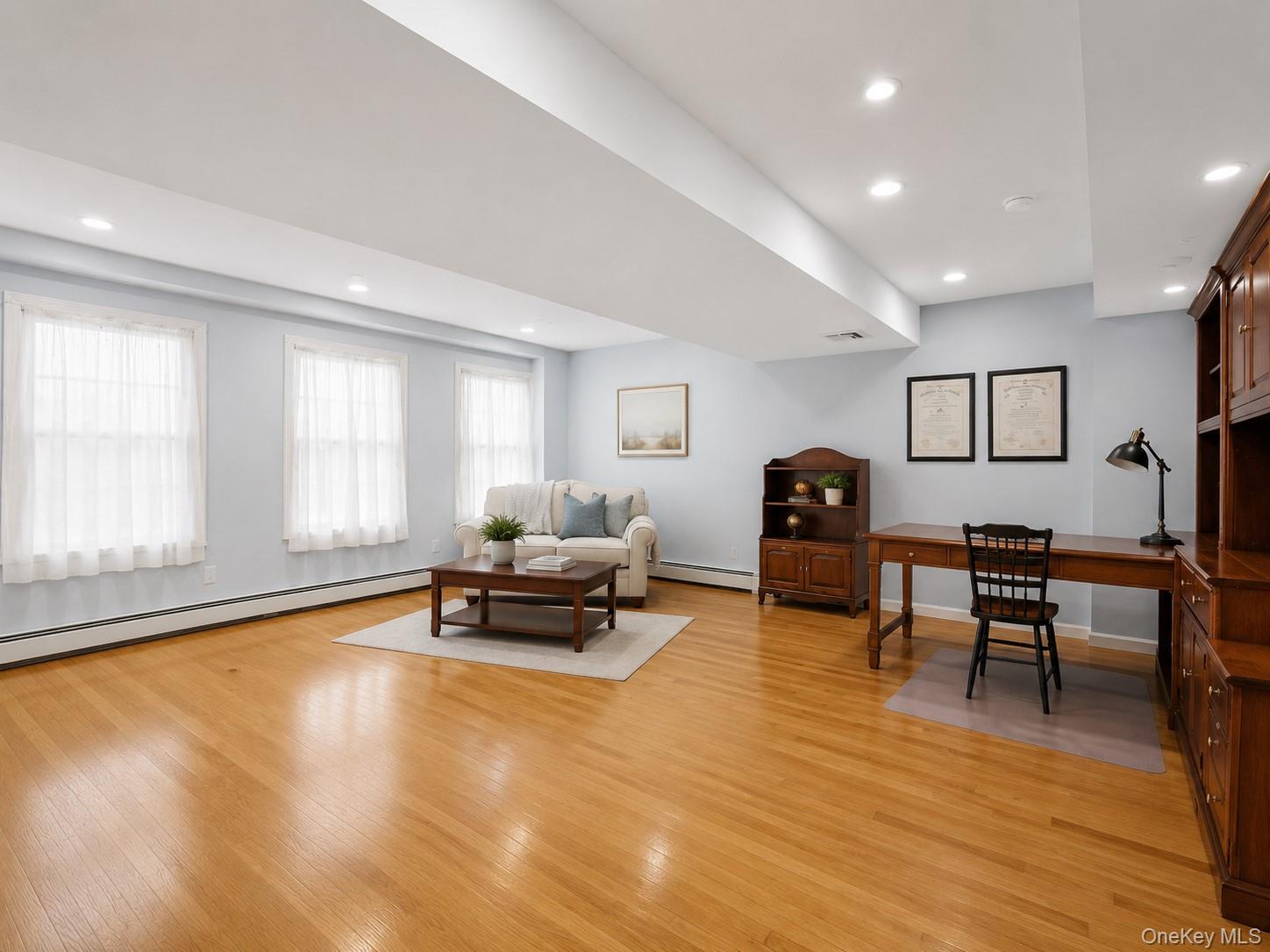 26 Century Ridge Road Purchase, NY 10577 - Photo 26 of 50 Substantial home office or exercise room with light wood-finish flooring (split level down from main)