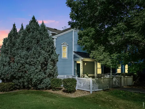 a view of house with backyard and garden
