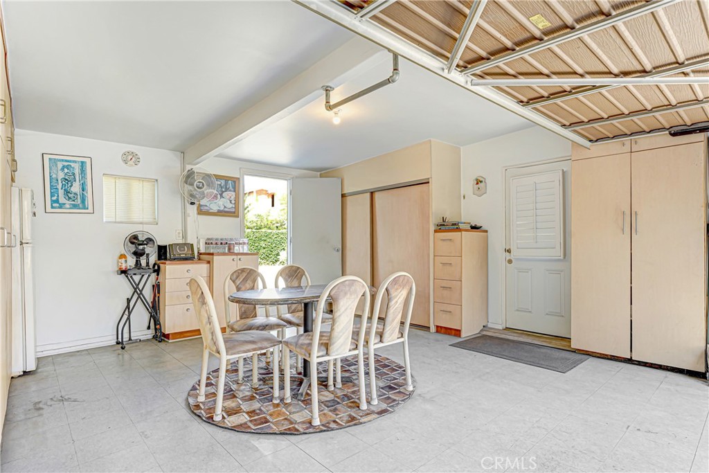 4313 Rhodes Avenue Studio City, CA 91604 - Photo 20 of 23 a view of a dining room with furniture window and outside view