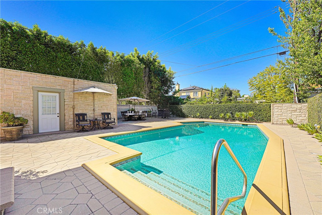 4313 Rhodes Avenue Studio City, CA 91604 - Photo 2 of 23 a view of a swimming pool with a patio