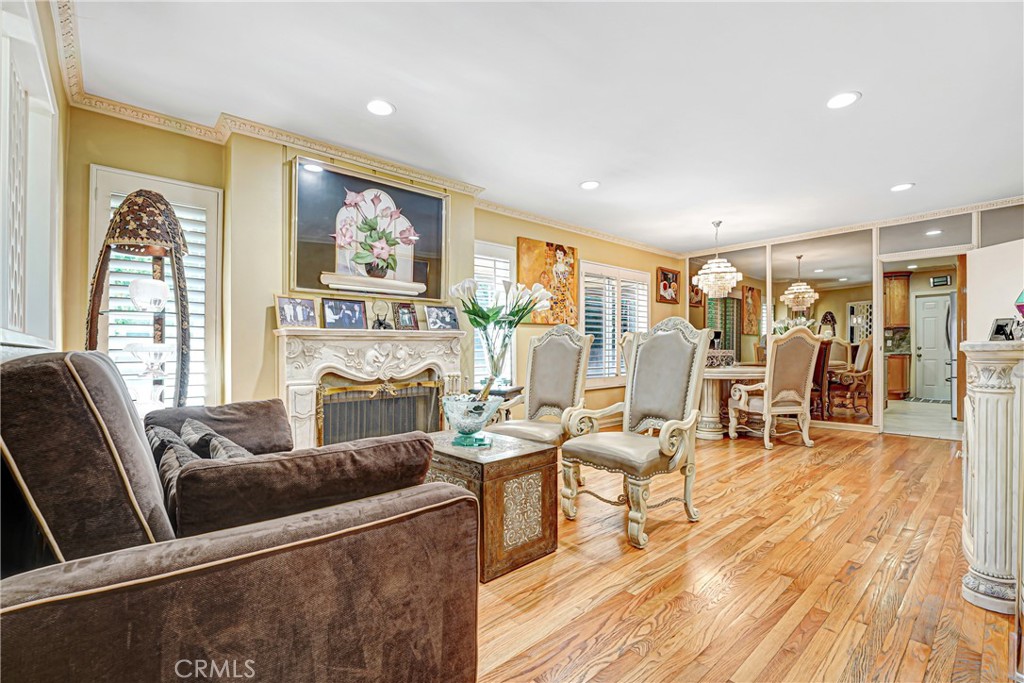 4313 Rhodes Avenue Studio City, CA 91604 - Photo 3 of 23 a living room with fireplace furniture and a large window