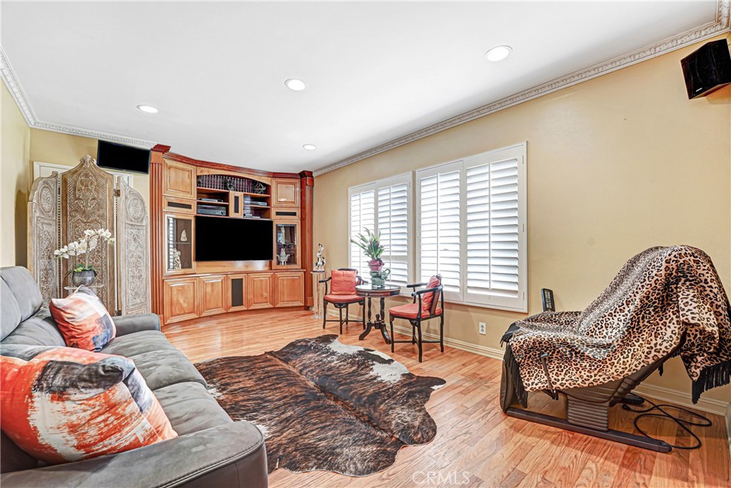 4313 Rhodes Avenue Studio City, CA 91604 - Photo 8 of 23 a living room with furniture and a flat screen tv