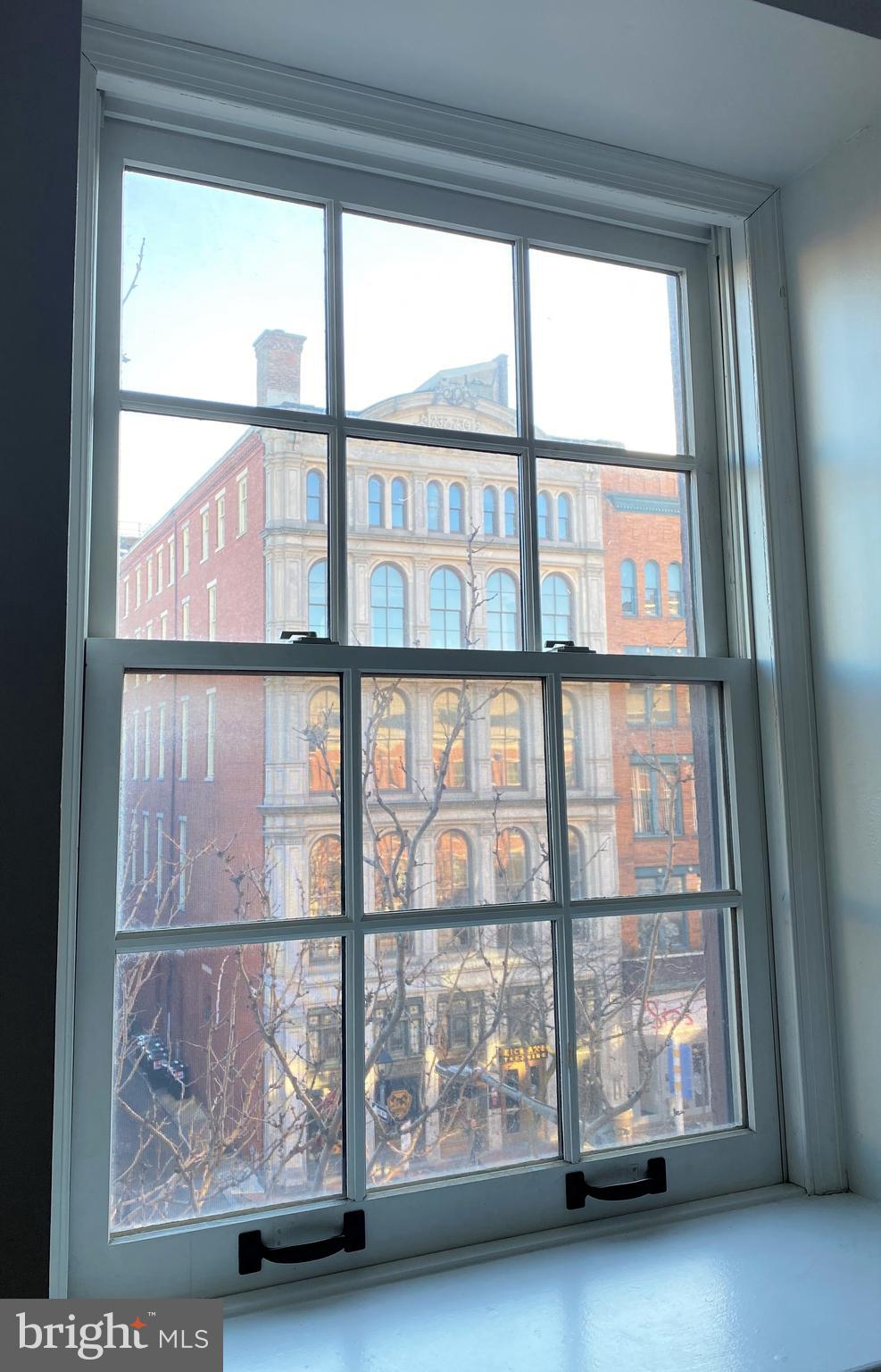 222 Church Street, Unit 4K Philadelphia, PA 19106 - Photo 14 of 16 a view of an empty room with a large window