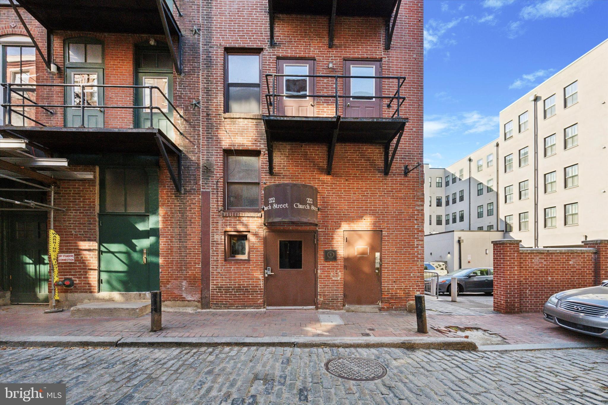 222 Church Street, Unit 4K Philadelphia, PA 19106 - Photo 3 of 16 a front view of a building with street