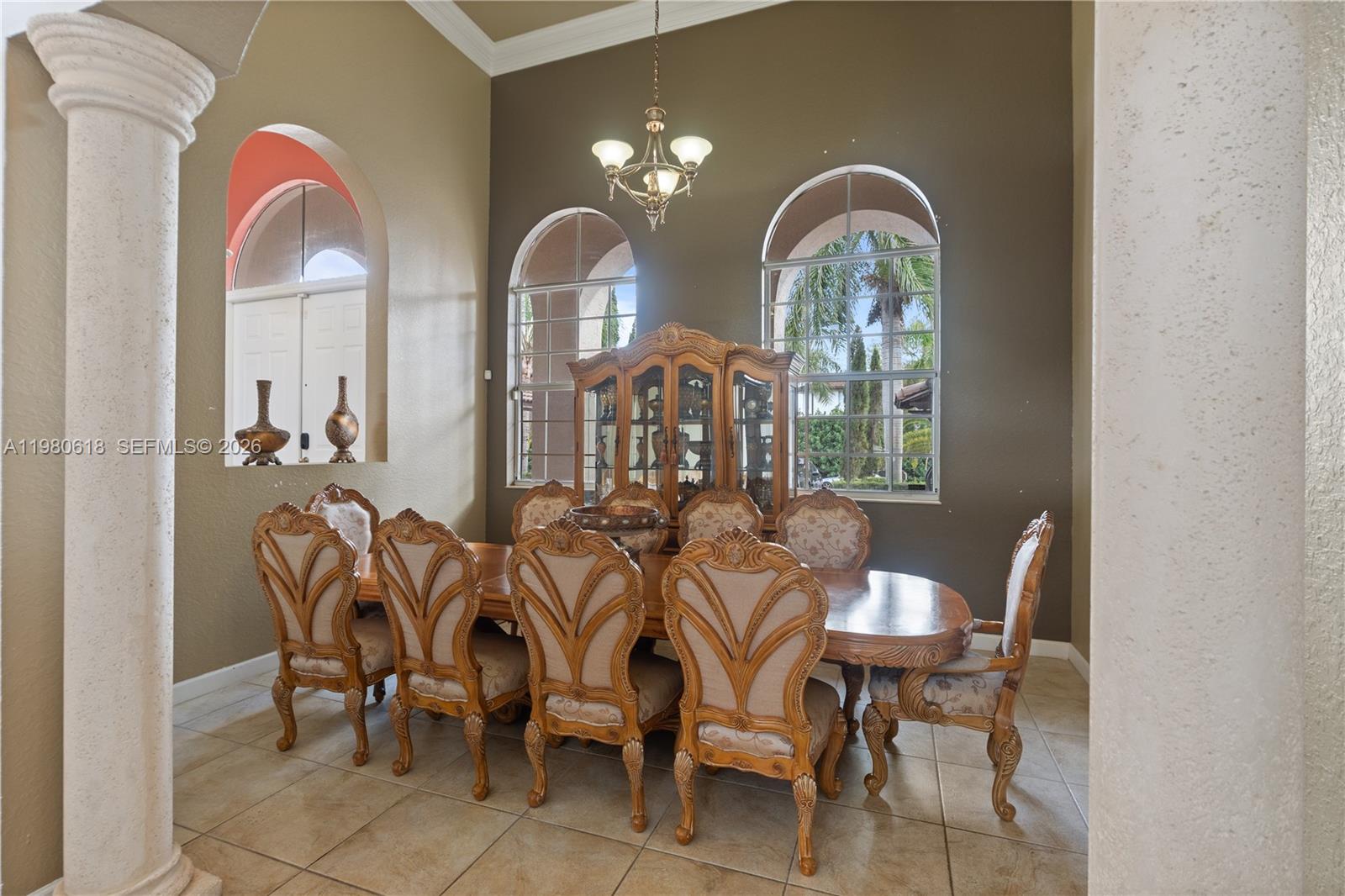 12981 Southwest 197th Street Miami, FL 33177 - Photo 11 of 75 a view of a dining room with furniture and window