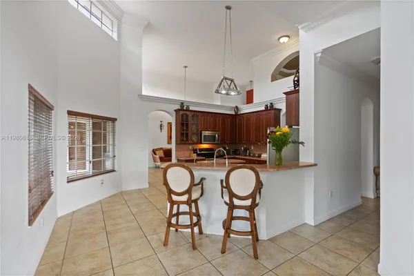 a bed room with furniture and a window