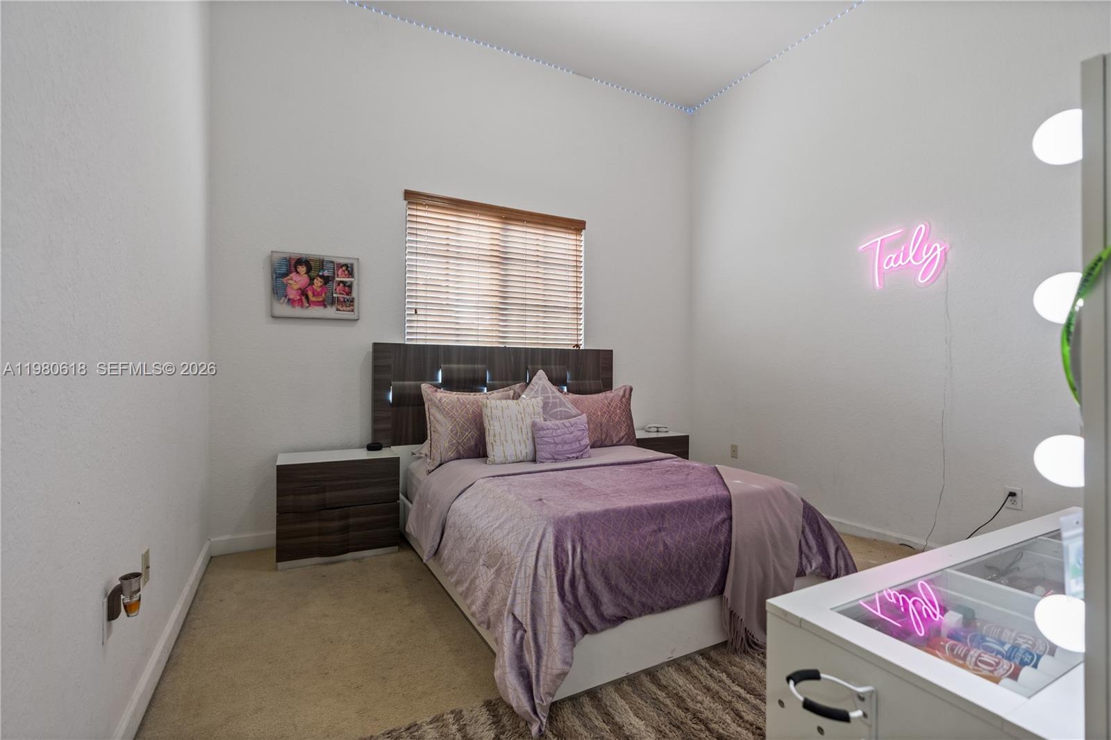12981 Southwest 197th Street Miami, FL 33177 - Photo 22 of 75 a bedroom with a bed and a window