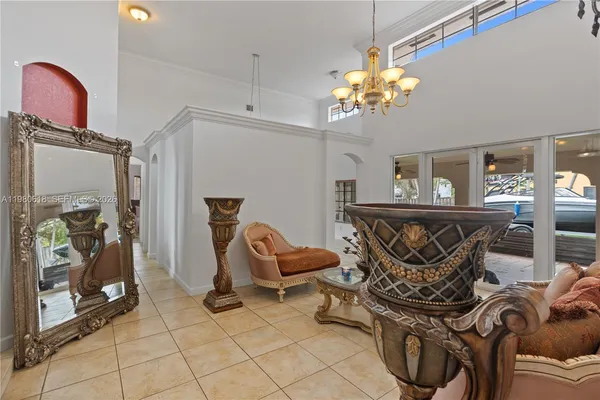a living room with fireplace furniture and decor