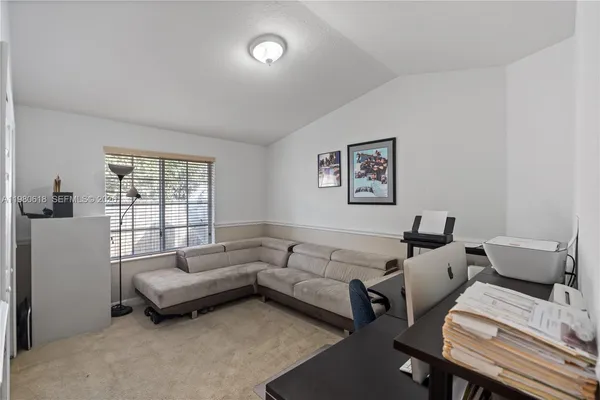 a view of a house with a large window