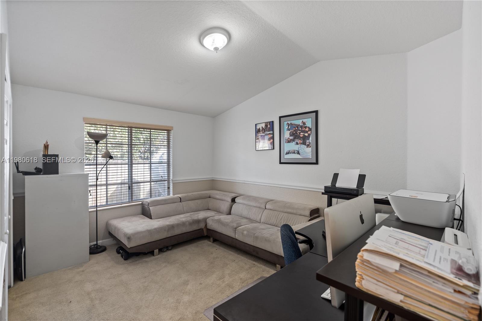 12981 Southwest 197th Street Miami, FL 33177 - Photo 46 of 75 a living room with furniture and a window