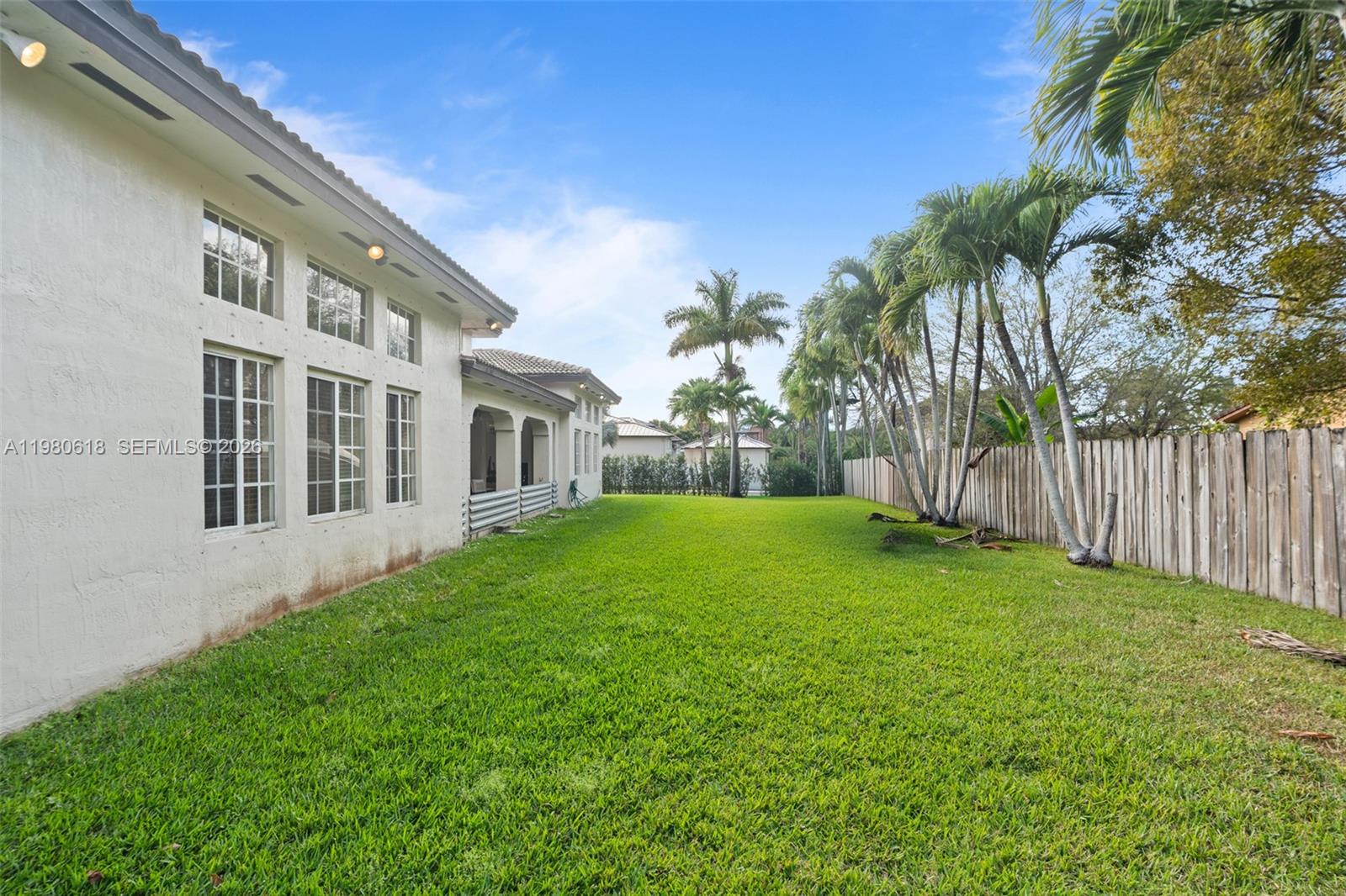 12981 Southwest 197th Street Miami, FL 33177 - Photo 52 of 75 a view of backyard of house with green space
