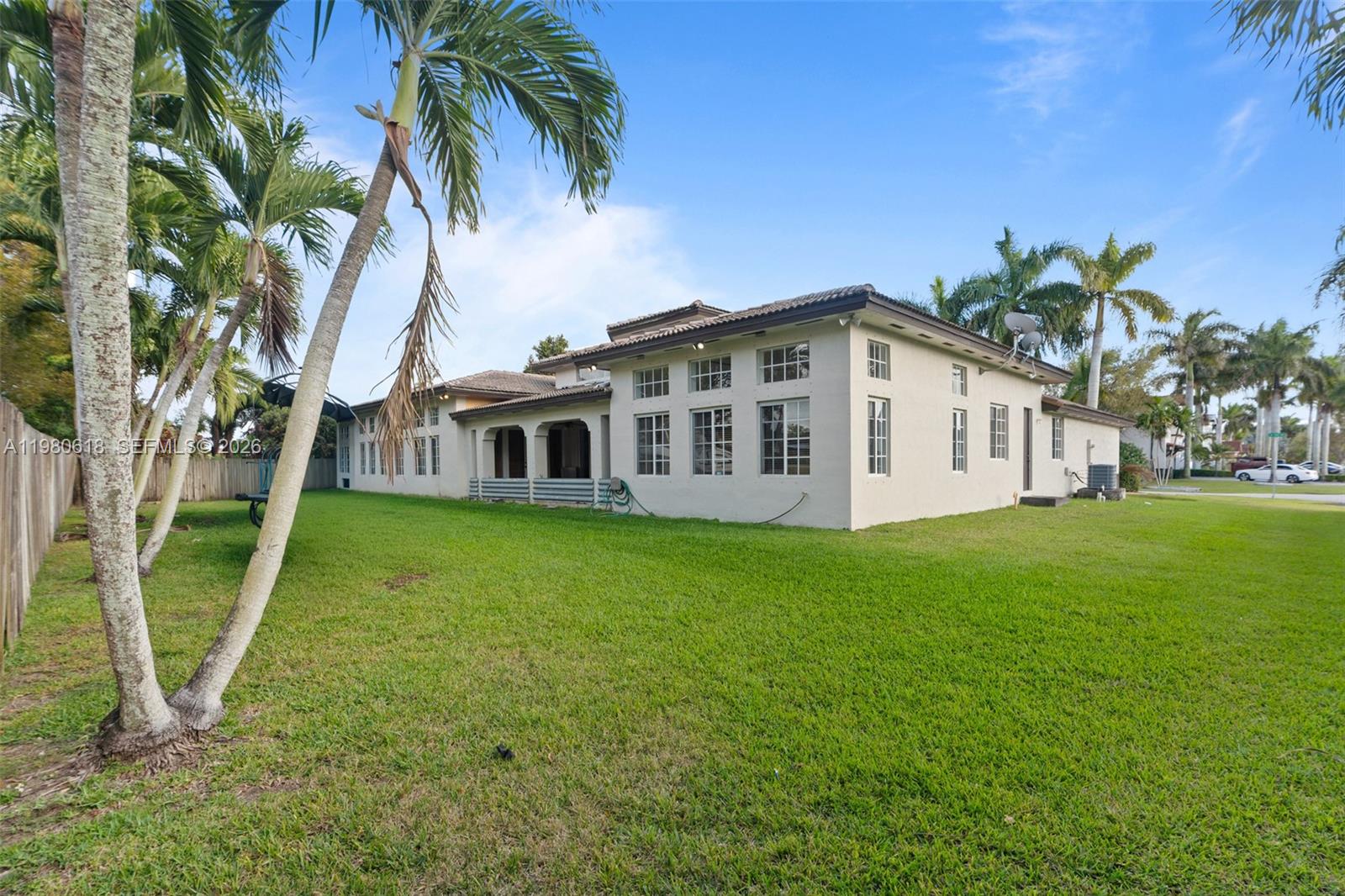 12981 Southwest 197th Street Miami, FL 33177 - Photo 56 of 75 a view of a house with a backyard