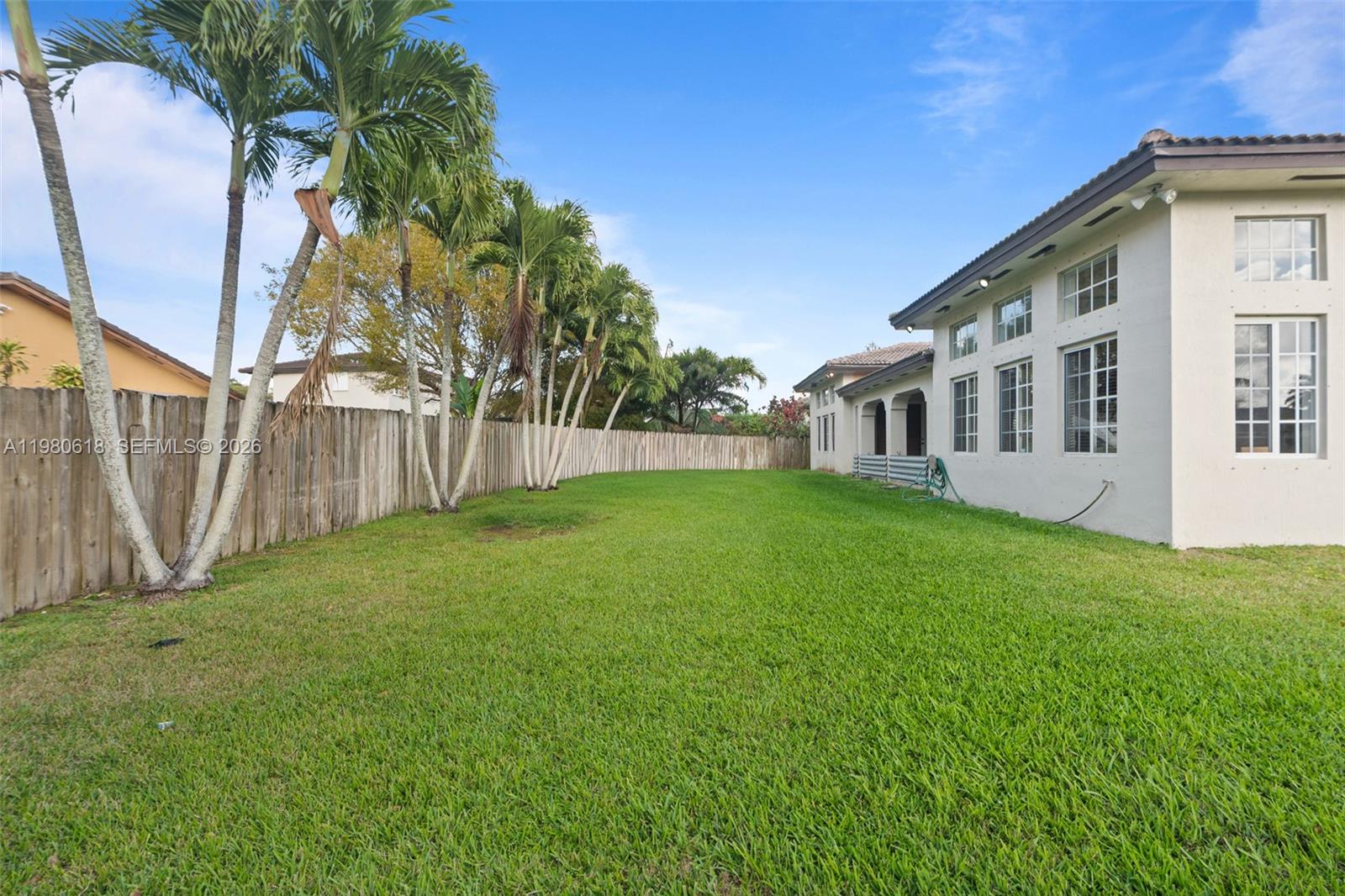 12981 Southwest 197th Street Miami, FL 33177 - Photo 57 of 75 a view of an house with backyard and sitting area