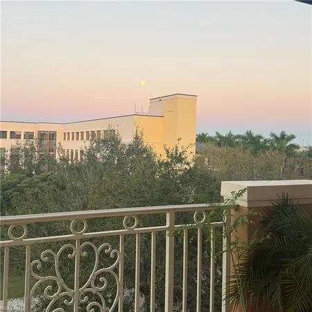 a view of a balcony with an ocean view