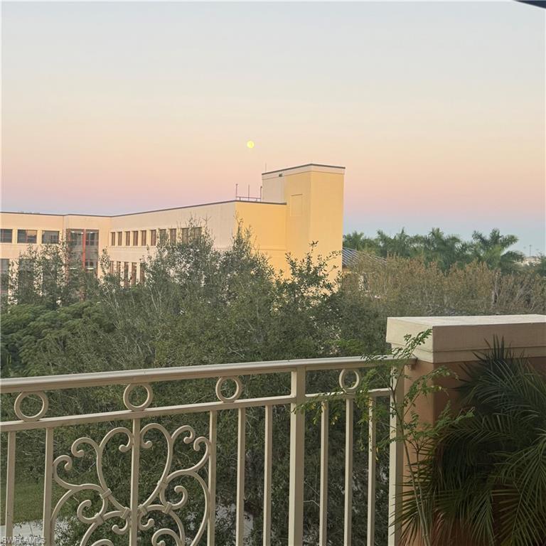 5080 Annunciation Circle, Unit 1306 Ave Maria, FL 34142 - Photo 2 of 6 a view of a balcony with an ocean view