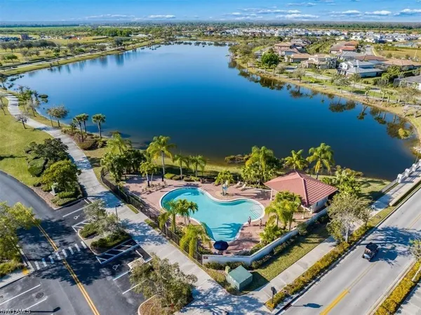 an aerial view of lake residential houses with outdoor space