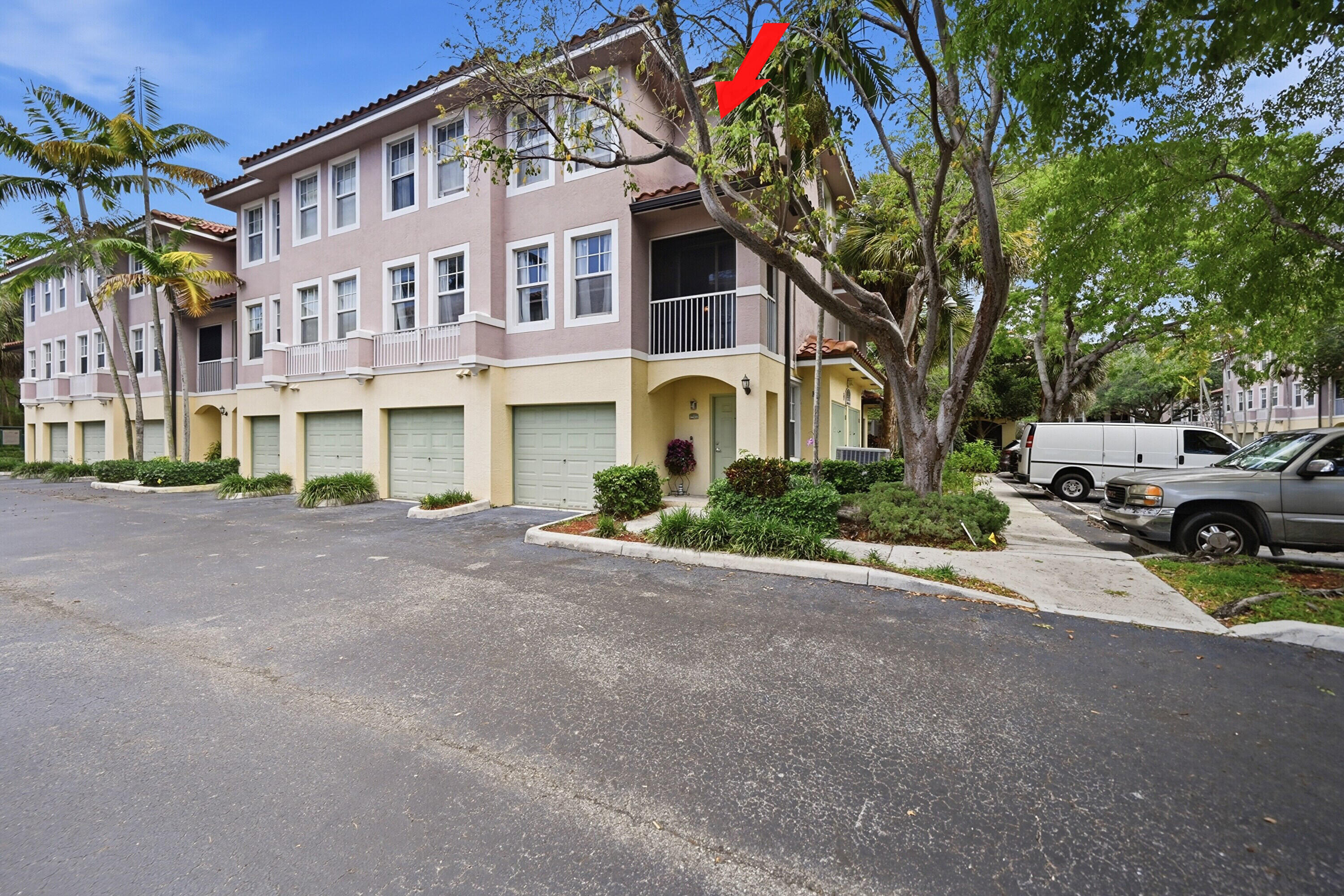 6450 West Sample Road, Unit 6450 Coral Springs, FL 33067 - Photo 1 of 41 a view of a building with a street