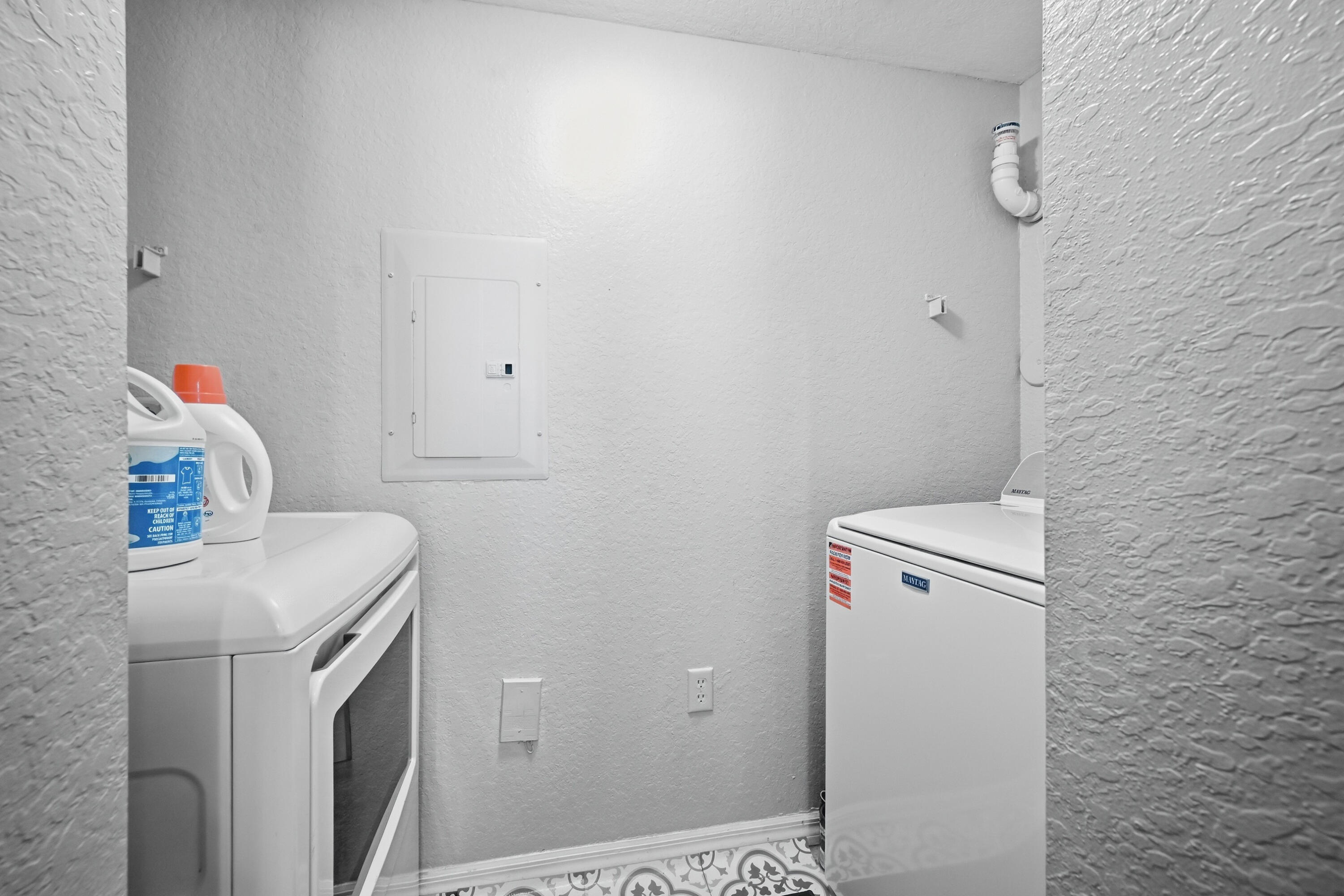 6450 West Sample Road, Unit 6450 Coral Springs, FL 33067 - Photo 13 of 41 a utility room with dryer and washer