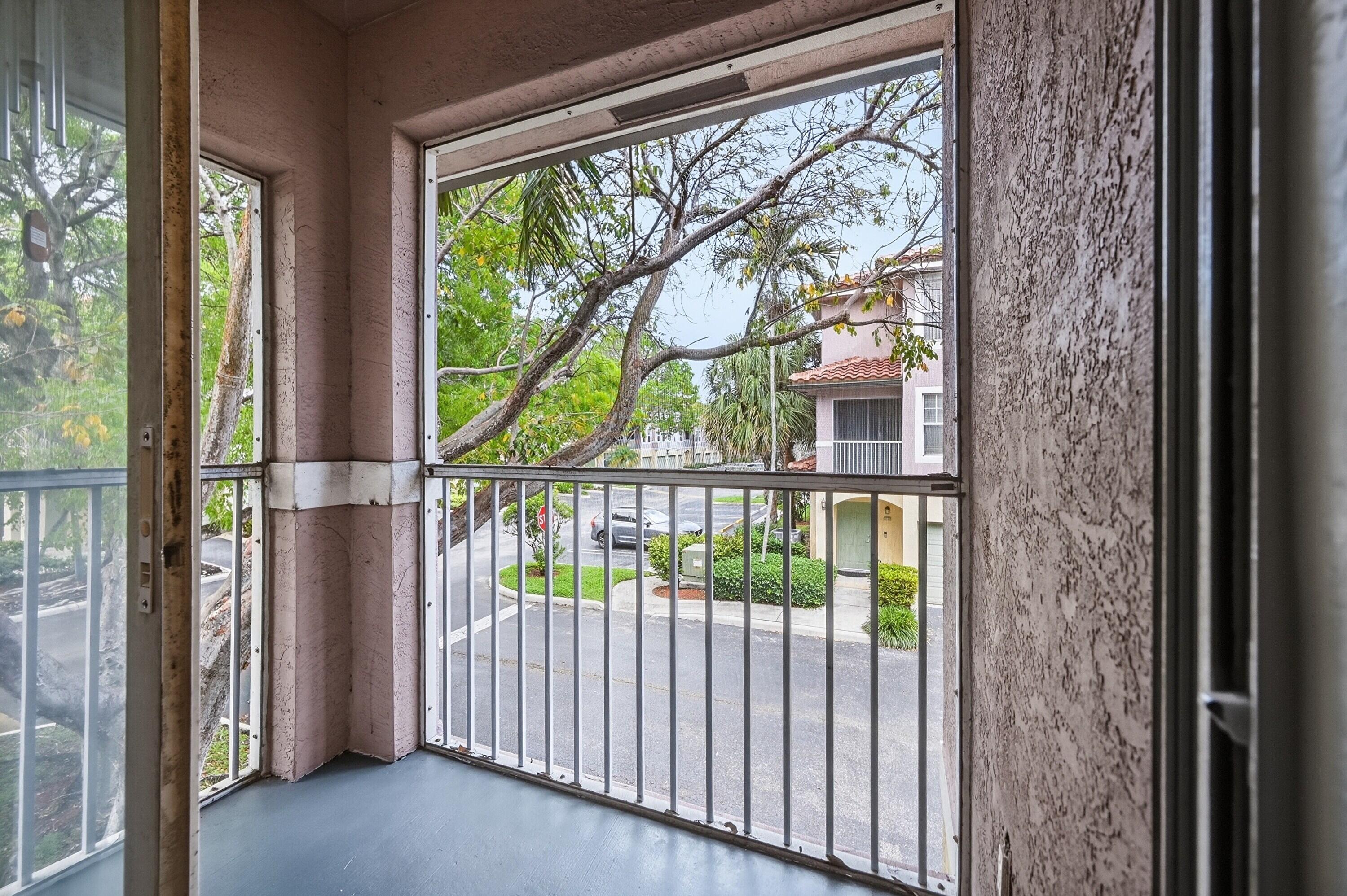 6450 West Sample Road, Unit 6450 Coral Springs, FL 33067 - Photo 15 of 41 a view of a porch