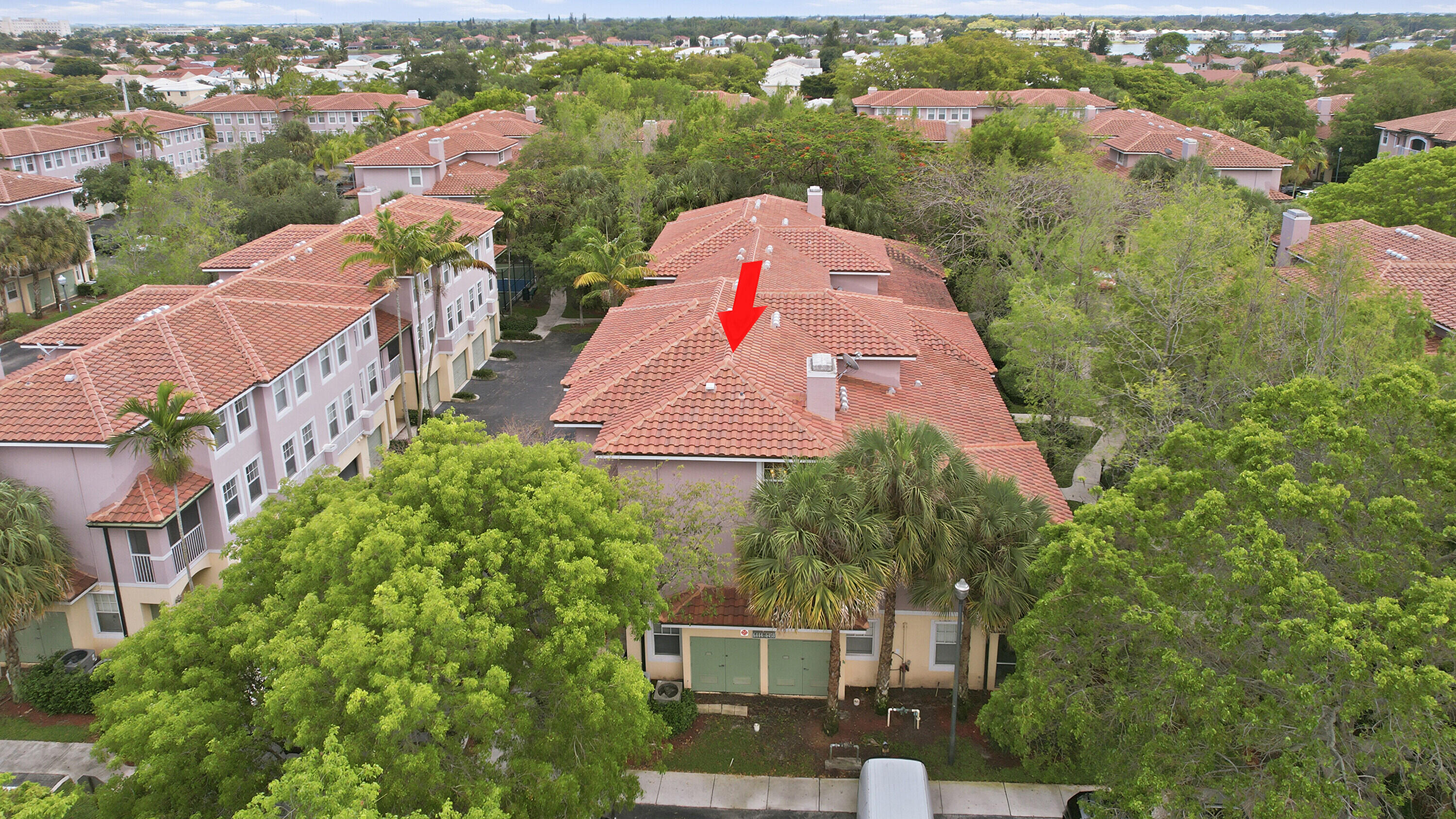 6450 West Sample Road, Unit 6450 Coral Springs, FL 33067 - Photo 25 of 41 an aerial view of house with yard and mountain view in back