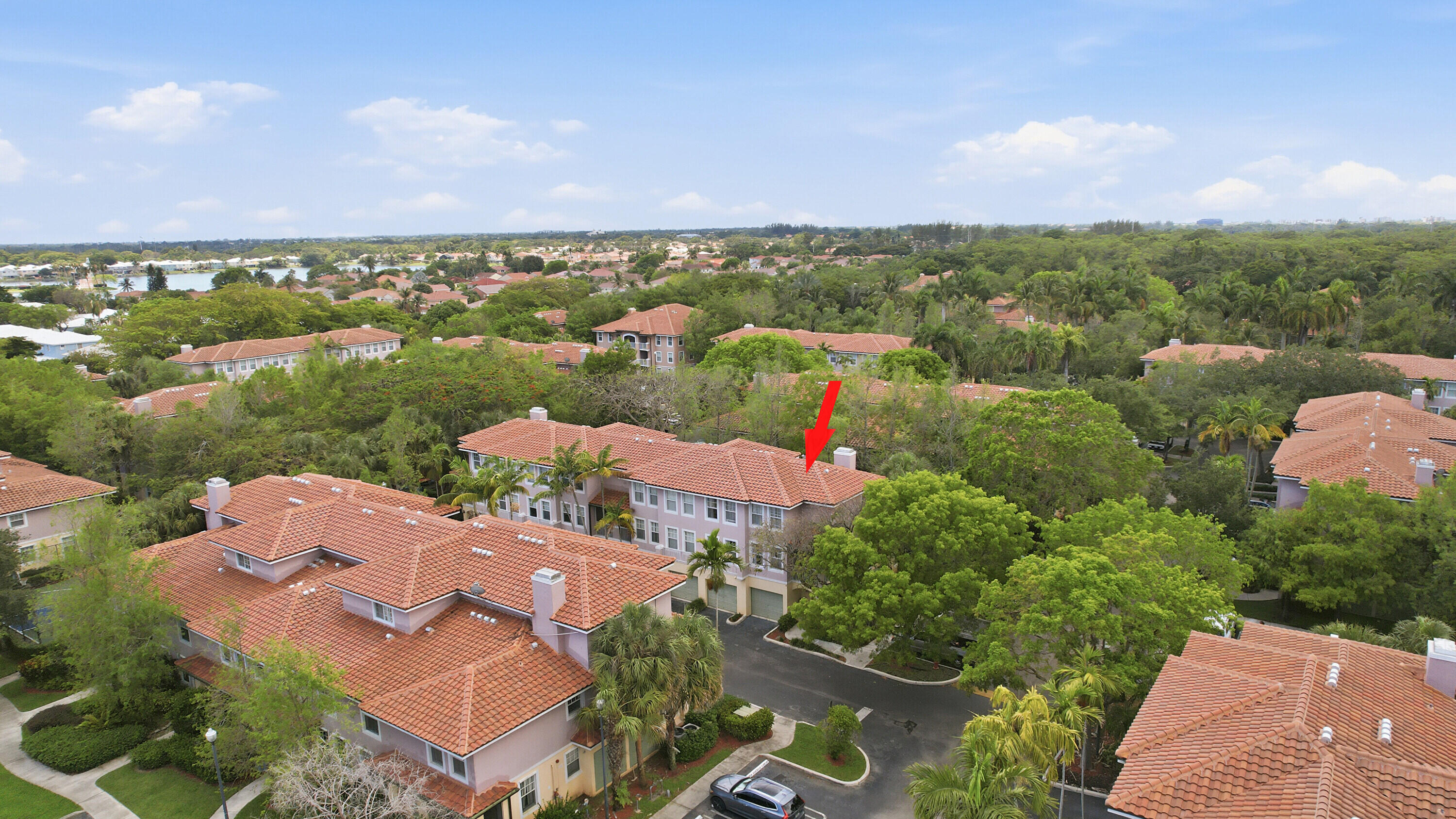 6450 West Sample Road, Unit 6450 Coral Springs, FL 33067 - Photo 29 of 41 an aerial view of a city with lots of residential buildings