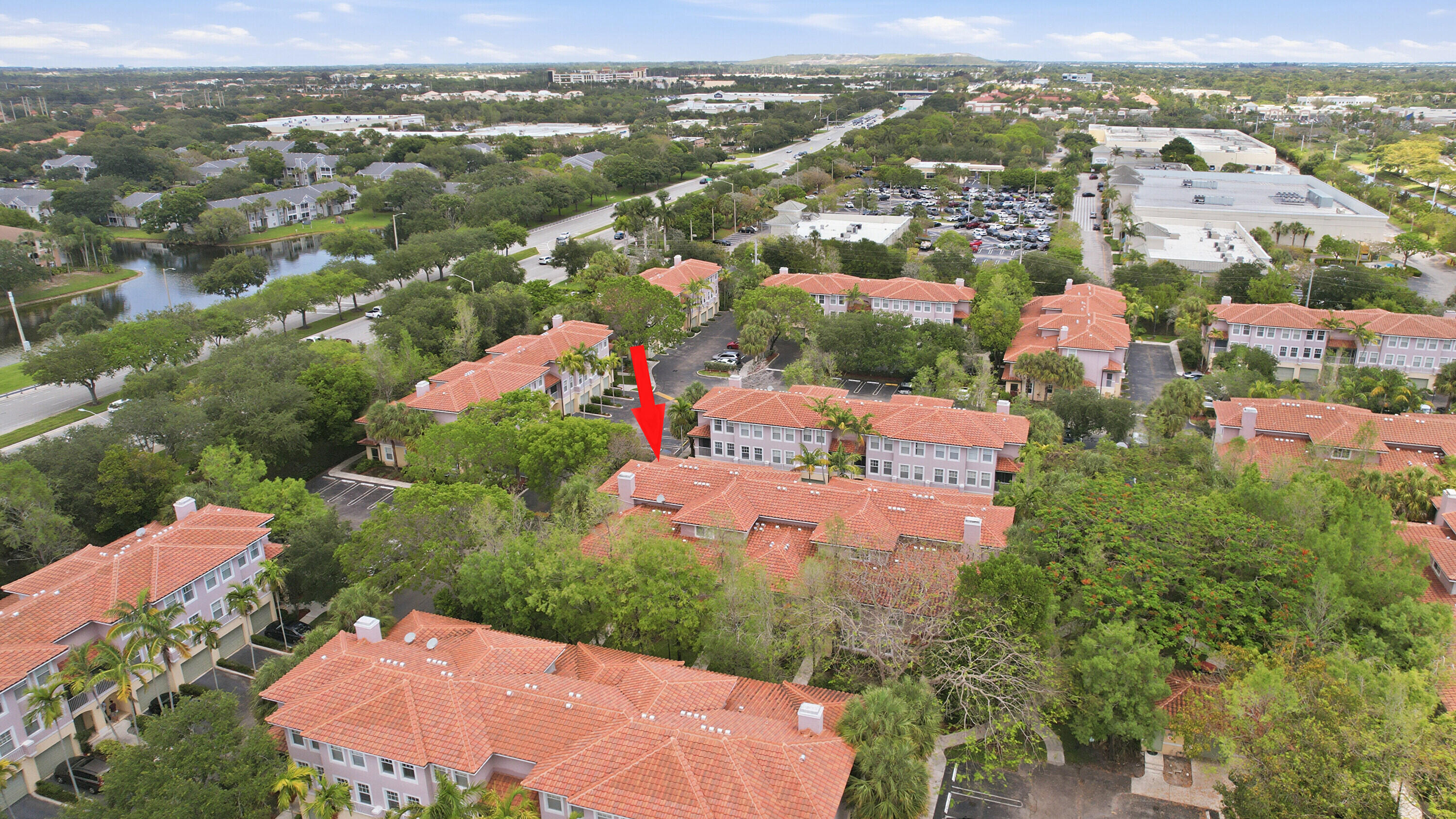 6450 West Sample Road, Unit 6450 Coral Springs, FL 33067 - Photo 32 of 41 an aerial view of residential houses with outdoor space