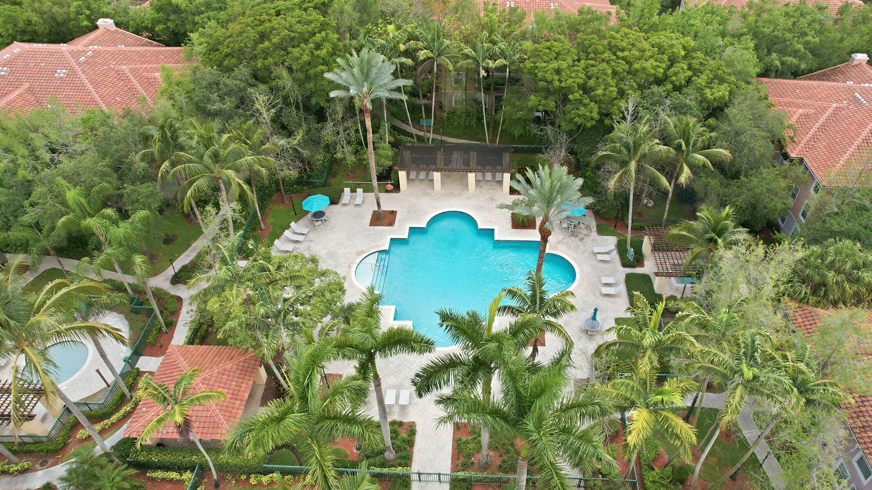 6450 West Sample Road, Unit 6450 Coral Springs, FL 33067 - Photo 36 of 41 an aerial view of a house with a yard