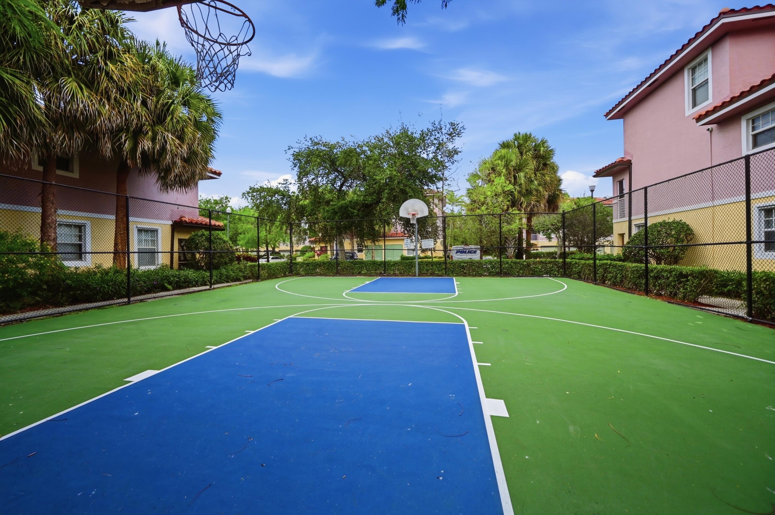 6450 West Sample Road, Unit 6450 Coral Springs, FL 33067 - Photo 40 of 41 a view of a park with palm trees