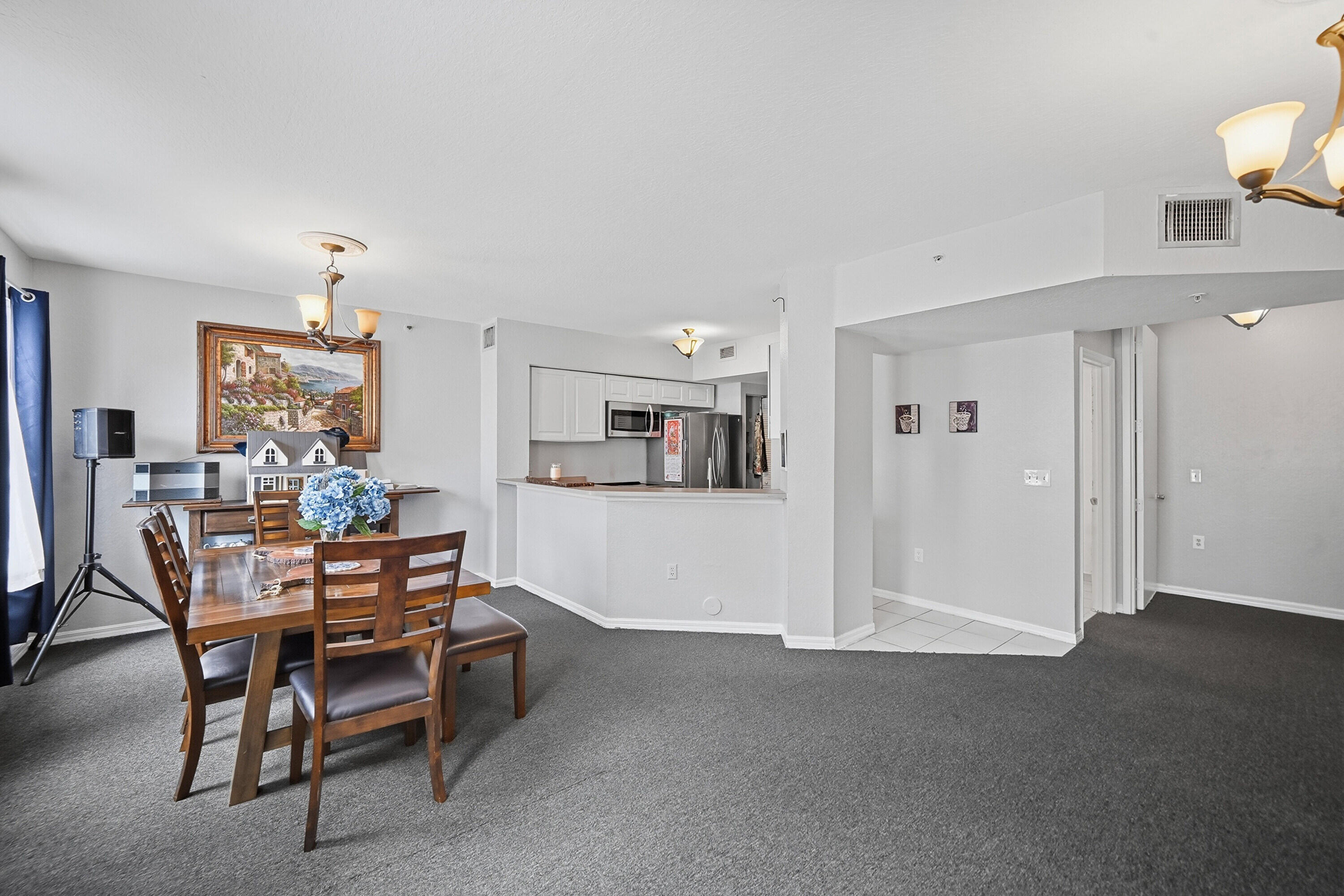 6450 West Sample Road, Unit 6450 Coral Springs, FL 33067 - Photo 9 of 41 a view of a dining room with furniture and window