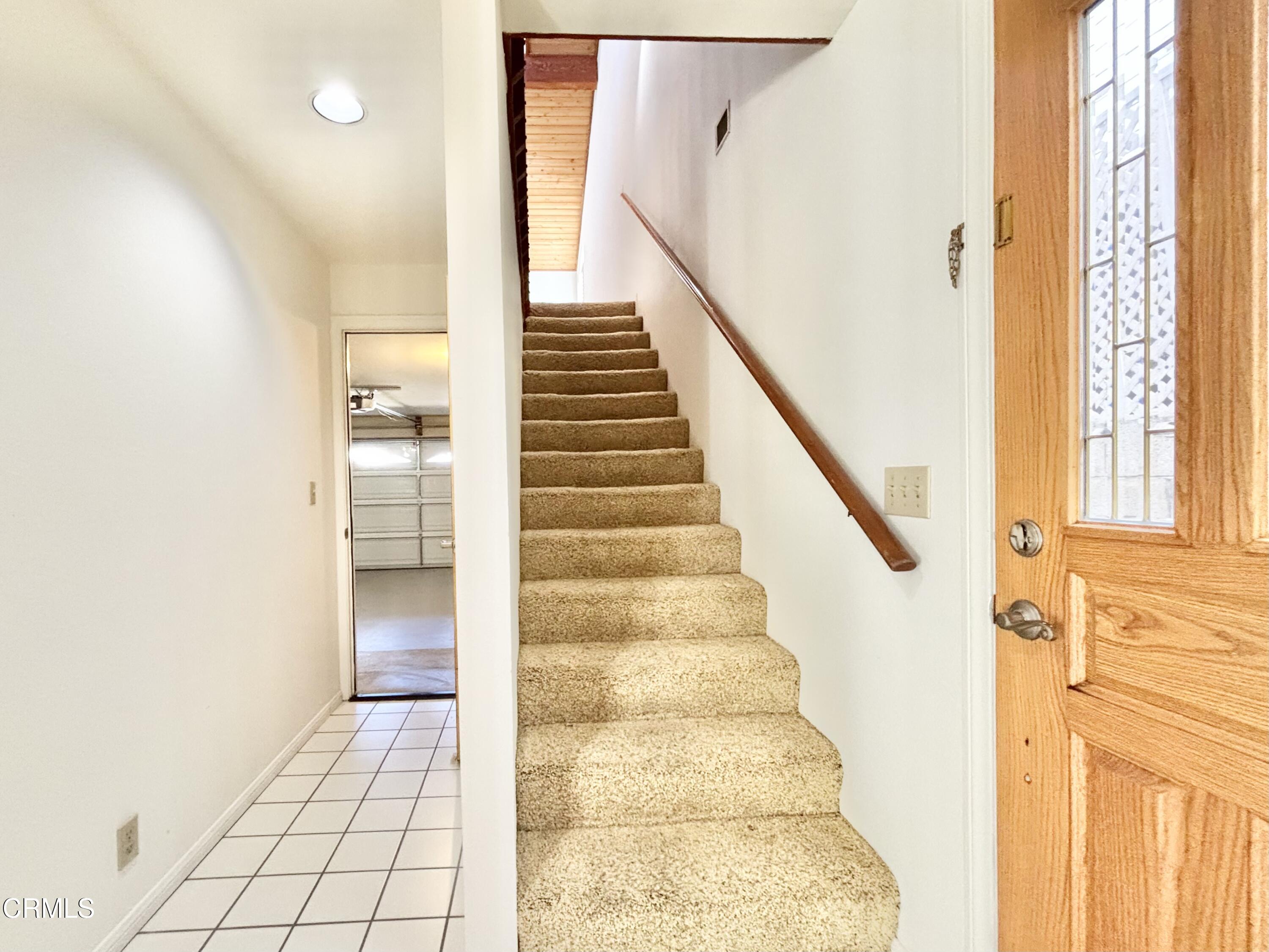 272 Cahuenga Drive Oxnard, CA 93035 - Photo 16 of 39 a view of an entryway with wooden floor and staircase